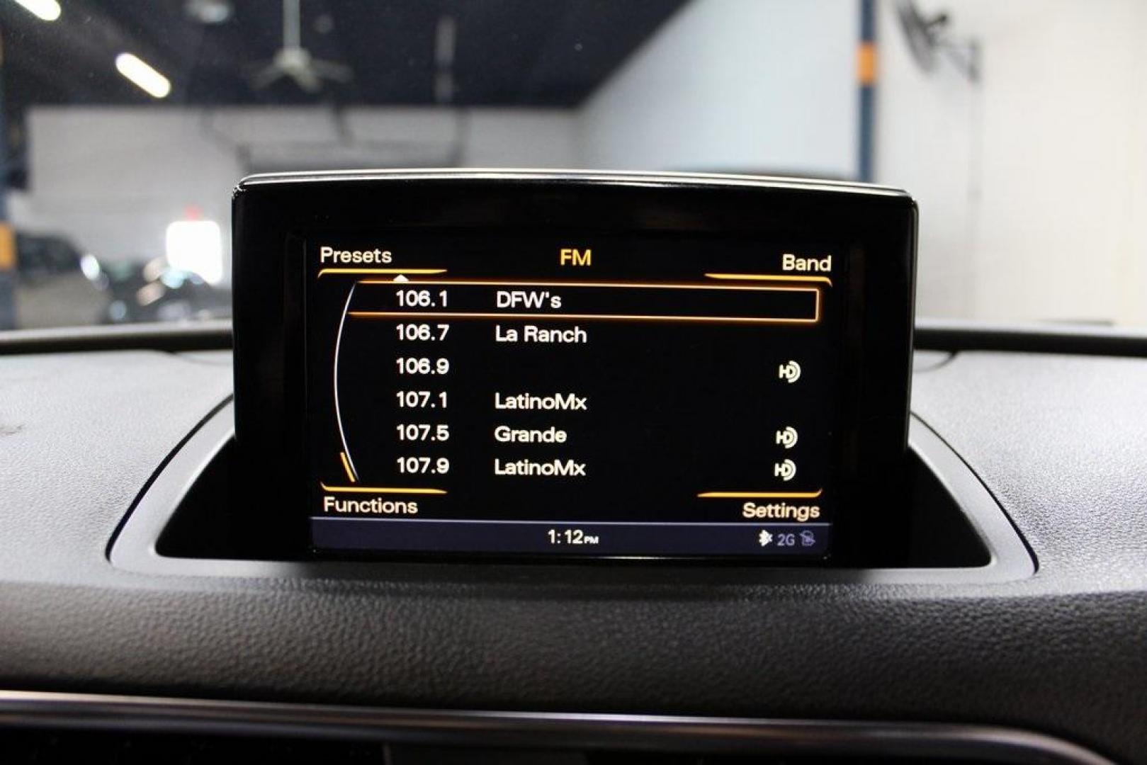 2016 Brilliant Black /Black Audi Q3 2.0T Prestige (WA1FFCFS4GR) with an 2.0L 4-Cylinder TFSI engine, Automatic transmission, located at 15300 Midway Rd., Addison, TX, 75001, (972) 702-0011, 32.958321, -96.838074 - HOME OF THE NO HAGGLE PRICE - WHOLESALE PRICES TO THE PUBLIC!!<br><br>Brilliant Black 2016 Audi Q3 2.0T Prestige<br><br>20/29 City/Highway MPG<br><br>Awards:<br> * JD Power Initial Quality Study (IQS), Vehicle Dependability Study * JD Power Initial Quality Study (IQS), Vehicle Dependability Study - Photo#18