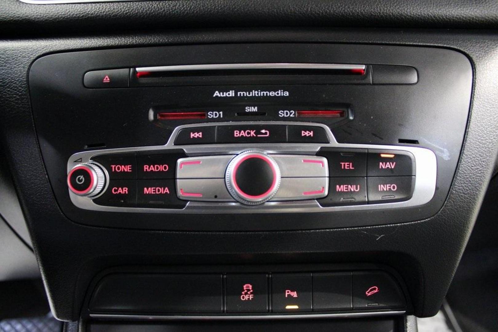 2016 Brilliant Black /Black Audi Q3 2.0T Prestige (WA1FFCFS4GR) with an 2.0L 4-Cylinder TFSI engine, Automatic transmission, located at 15300 Midway Rd., Addison, TX, 75001, (972) 702-0011, 32.958321, -96.838074 - HOME OF THE NO HAGGLE PRICE - WHOLESALE PRICES TO THE PUBLIC!!<br><br>Brilliant Black 2016 Audi Q3 2.0T Prestige<br><br>20/29 City/Highway MPG<br><br>Awards:<br> * JD Power Initial Quality Study (IQS), Vehicle Dependability Study * JD Power Initial Quality Study (IQS), Vehicle Dependability Study - Photo#21