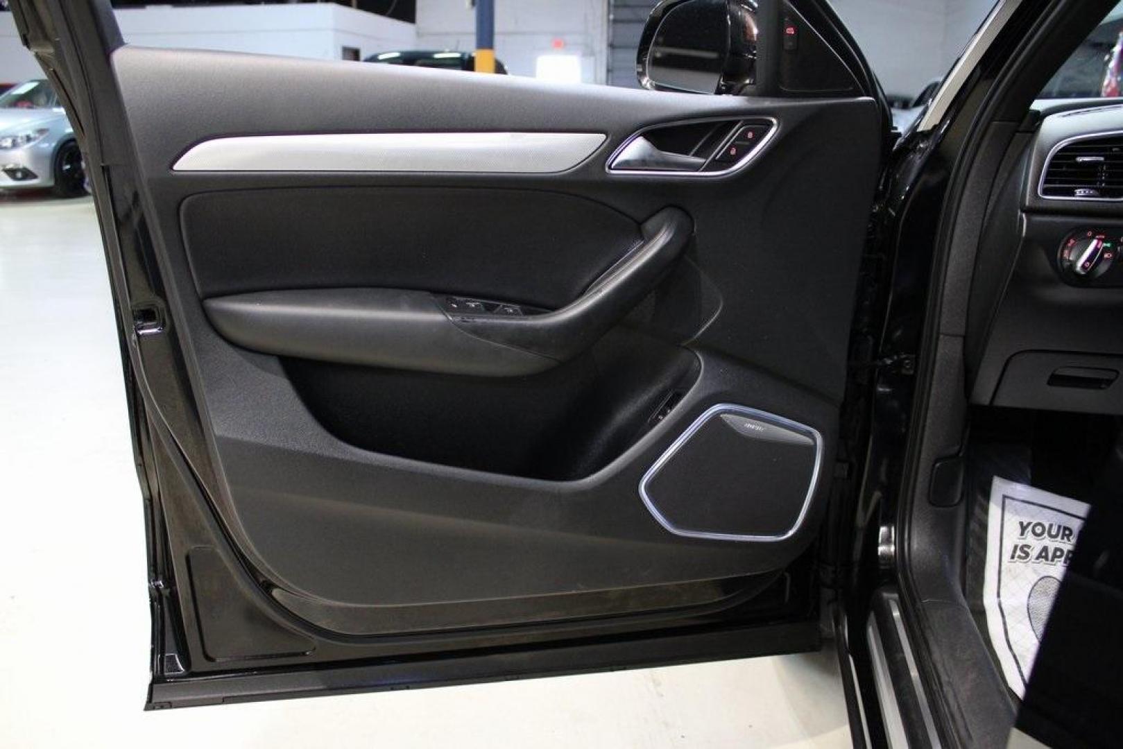 2016 Brilliant Black /Black Audi Q3 2.0T Prestige (WA1FFCFS4GR) with an 2.0L 4-Cylinder TFSI engine, Automatic transmission, located at 15300 Midway Rd., Addison, TX, 75001, (972) 702-0011, 32.958321, -96.838074 - HOME OF THE NO HAGGLE PRICE - WHOLESALE PRICES TO THE PUBLIC!!<br><br>Brilliant Black 2016 Audi Q3 2.0T Prestige<br><br>20/29 City/Highway MPG<br><br>Awards:<br> * JD Power Initial Quality Study (IQS), Vehicle Dependability Study * JD Power Initial Quality Study (IQS), Vehicle Dependability Study - Photo#27