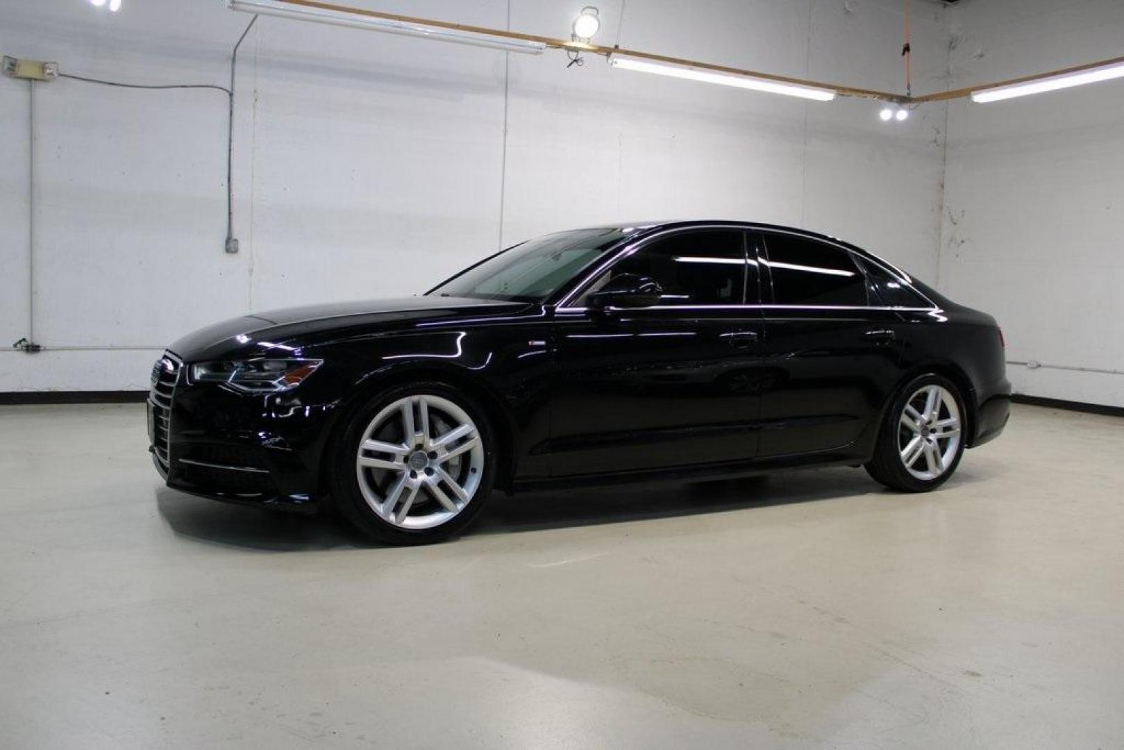 2016 Black Metallic /Brown Audi A6 2.0T Premium Plus (WAUGFAFC6GN) with an 2.0L 4-Cylinder TFSI engine, Automatic transmission, located at 15300 Midway Rd., Addison, TX, 75001, (972) 702-0011, 32.958321, -96.838074 - HOME OF THE NO HAGGLE PRICE - WHOLESALE PRICES TO THE PUBLIC!!<br><br>Black Metallic 2016 Audi A6 2.0T Premium Plus<br><br>22/32 City/Highway MPG<br><br>Awards:<br> * JD Power Automotive Performance, Execution and Layout (APEAL) Study<br><br>At Midway Auto Group, we strive to provide you with the b - Photo#4