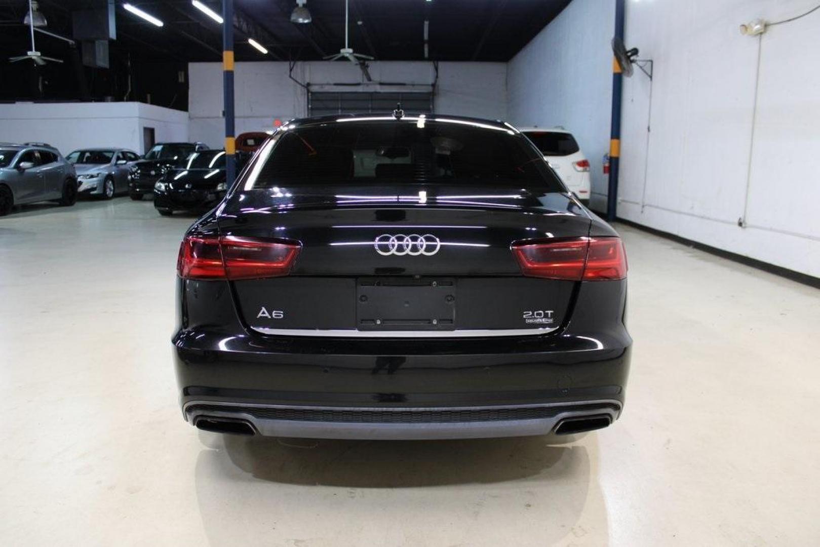 2016 Black Metallic /Brown Audi A6 2.0T Premium Plus (WAUGFAFC6GN) with an 2.0L 4-Cylinder TFSI engine, Automatic transmission, located at 15300 Midway Rd., Addison, TX, 75001, (972) 702-0011, 32.958321, -96.838074 - HOME OF THE NO HAGGLE PRICE - WHOLESALE PRICES TO THE PUBLIC!!<br><br>Black Metallic 2016 Audi A6 2.0T Premium Plus<br><br>22/32 City/Highway MPG<br><br>Awards:<br> * JD Power Automotive Performance, Execution and Layout (APEAL) Study<br><br>At Midway Auto Group, we strive to provide you with the b - Photo#7