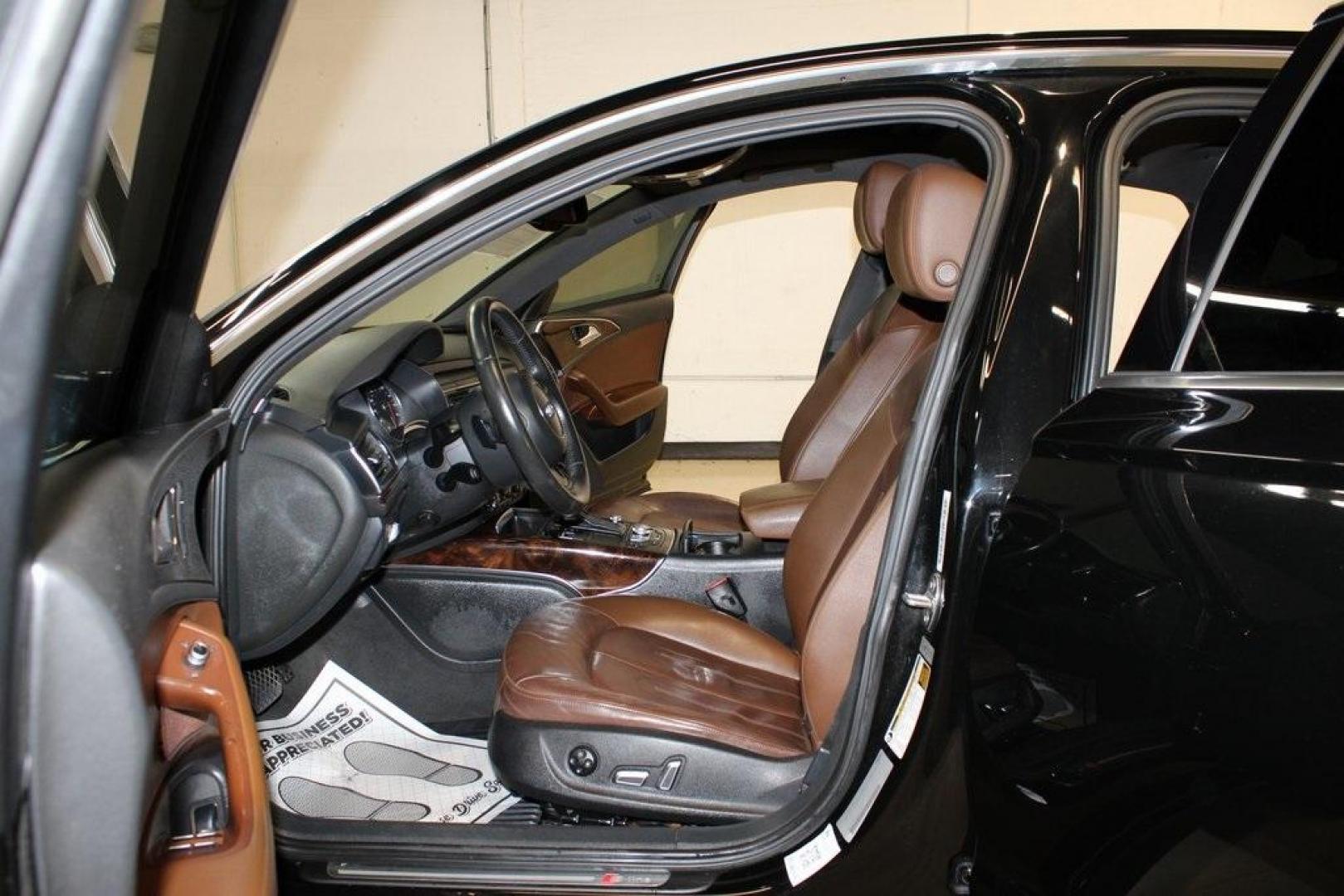 2016 Black Metallic /Brown Audi A6 2.0T Premium Plus (WAUGFAFC6GN) with an 2.0L 4-Cylinder TFSI engine, Automatic transmission, located at 15300 Midway Rd., Addison, TX, 75001, (972) 702-0011, 32.958321, -96.838074 - HOME OF THE NO HAGGLE PRICE - WHOLESALE PRICES TO THE PUBLIC!!<br><br>Black Metallic 2016 Audi A6 2.0T Premium Plus<br><br>22/32 City/Highway MPG<br><br>Awards:<br> * JD Power Automotive Performance, Execution and Layout (APEAL) Study<br><br>At Midway Auto Group, we strive to provide you with the b - Photo#14