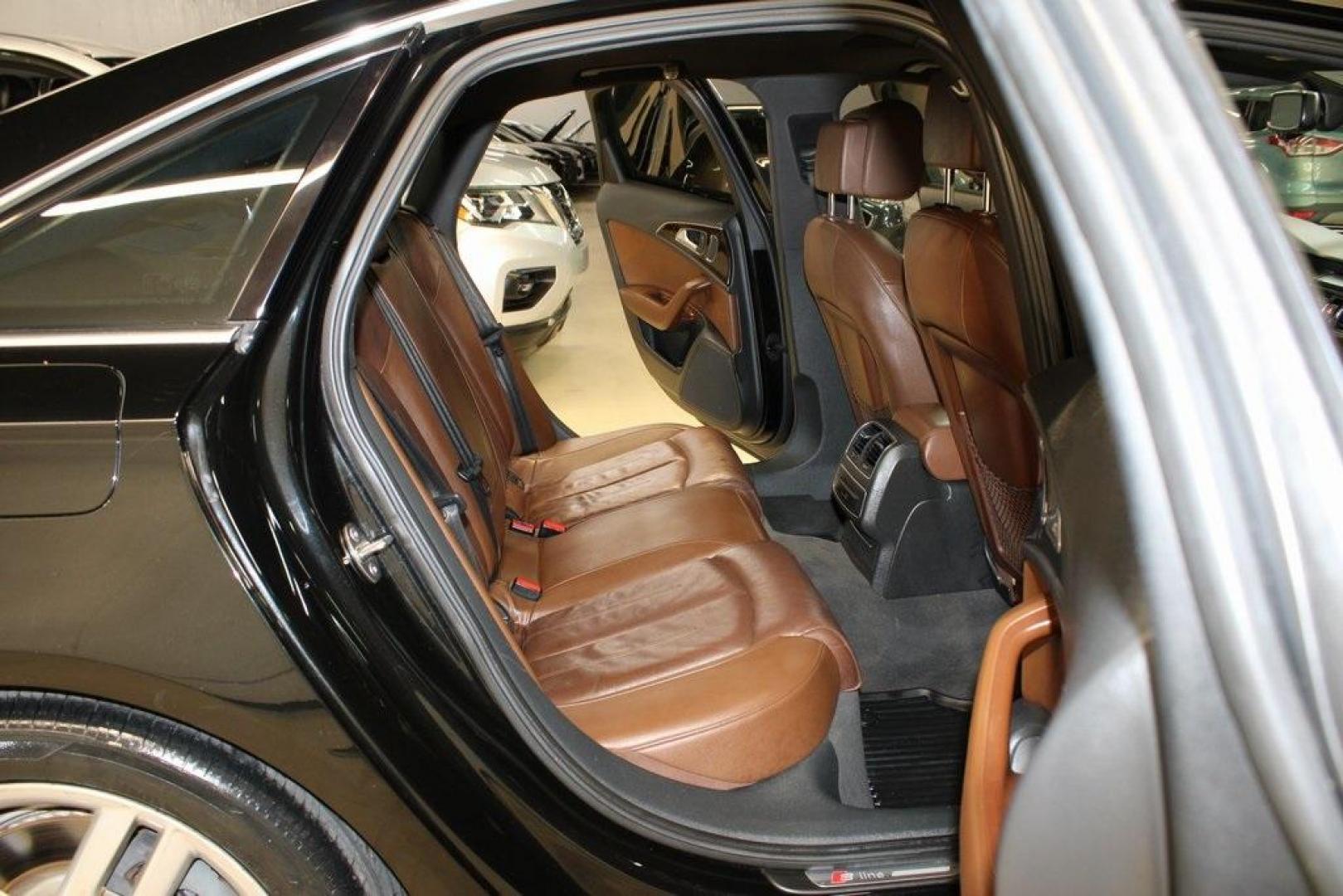 2016 Black Metallic /Brown Audi A6 2.0T Premium Plus (WAUGFAFC6GN) with an 2.0L 4-Cylinder TFSI engine, Automatic transmission, located at 15300 Midway Rd., Addison, TX, 75001, (972) 702-0011, 32.958321, -96.838074 - HOME OF THE NO HAGGLE PRICE - WHOLESALE PRICES TO THE PUBLIC!!<br><br>Black Metallic 2016 Audi A6 2.0T Premium Plus<br><br>22/32 City/Highway MPG<br><br>Awards:<br> * JD Power Automotive Performance, Execution and Layout (APEAL) Study<br><br>At Midway Auto Group, we strive to provide you with the b - Photo#16