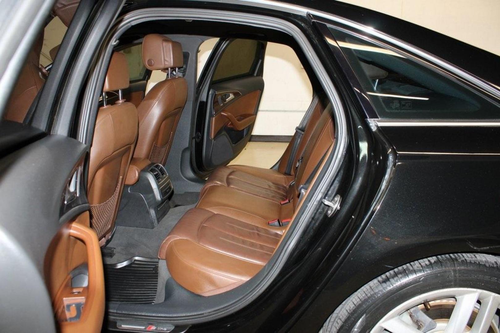2016 Black Metallic /Brown Audi A6 2.0T Premium Plus (WAUGFAFC6GN) with an 2.0L 4-Cylinder TFSI engine, Automatic transmission, located at 15300 Midway Rd., Addison, TX, 75001, (972) 702-0011, 32.958321, -96.838074 - HOME OF THE NO HAGGLE PRICE - WHOLESALE PRICES TO THE PUBLIC!!<br><br>Black Metallic 2016 Audi A6 2.0T Premium Plus<br><br>22/32 City/Highway MPG<br><br>Awards:<br> * JD Power Automotive Performance, Execution and Layout (APEAL) Study<br><br>At Midway Auto Group, we strive to provide you with the b - Photo#17
