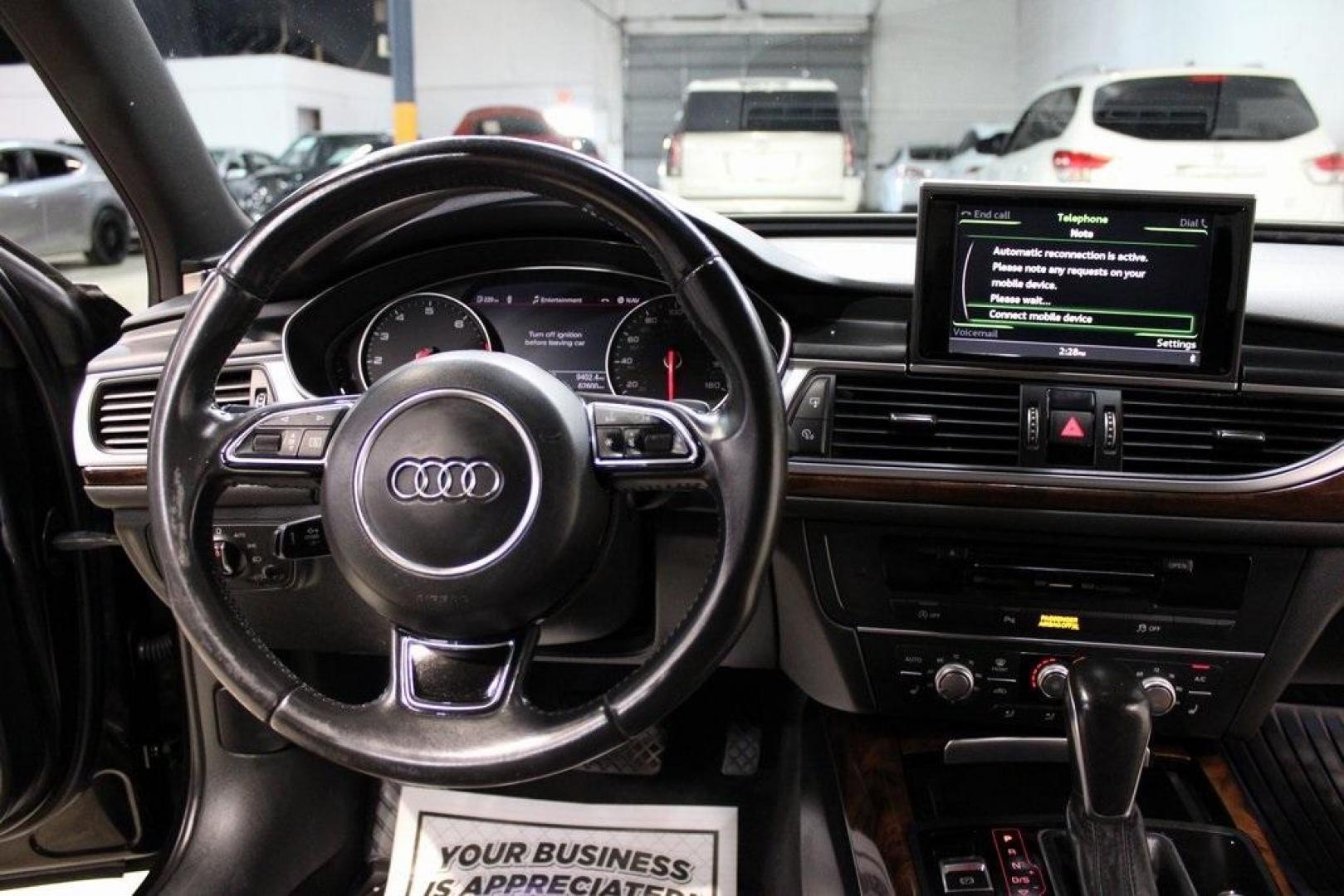 2016 Black Metallic /Brown Audi A6 2.0T Premium Plus (WAUGFAFC6GN) with an 2.0L 4-Cylinder TFSI engine, Automatic transmission, located at 15300 Midway Rd., Addison, TX, 75001, (972) 702-0011, 32.958321, -96.838074 - HOME OF THE NO HAGGLE PRICE - WHOLESALE PRICES TO THE PUBLIC!!<br><br>Black Metallic 2016 Audi A6 2.0T Premium Plus<br><br>22/32 City/Highway MPG<br><br>Awards:<br> * JD Power Automotive Performance, Execution and Layout (APEAL) Study<br><br>At Midway Auto Group, we strive to provide you with the b - Photo#18