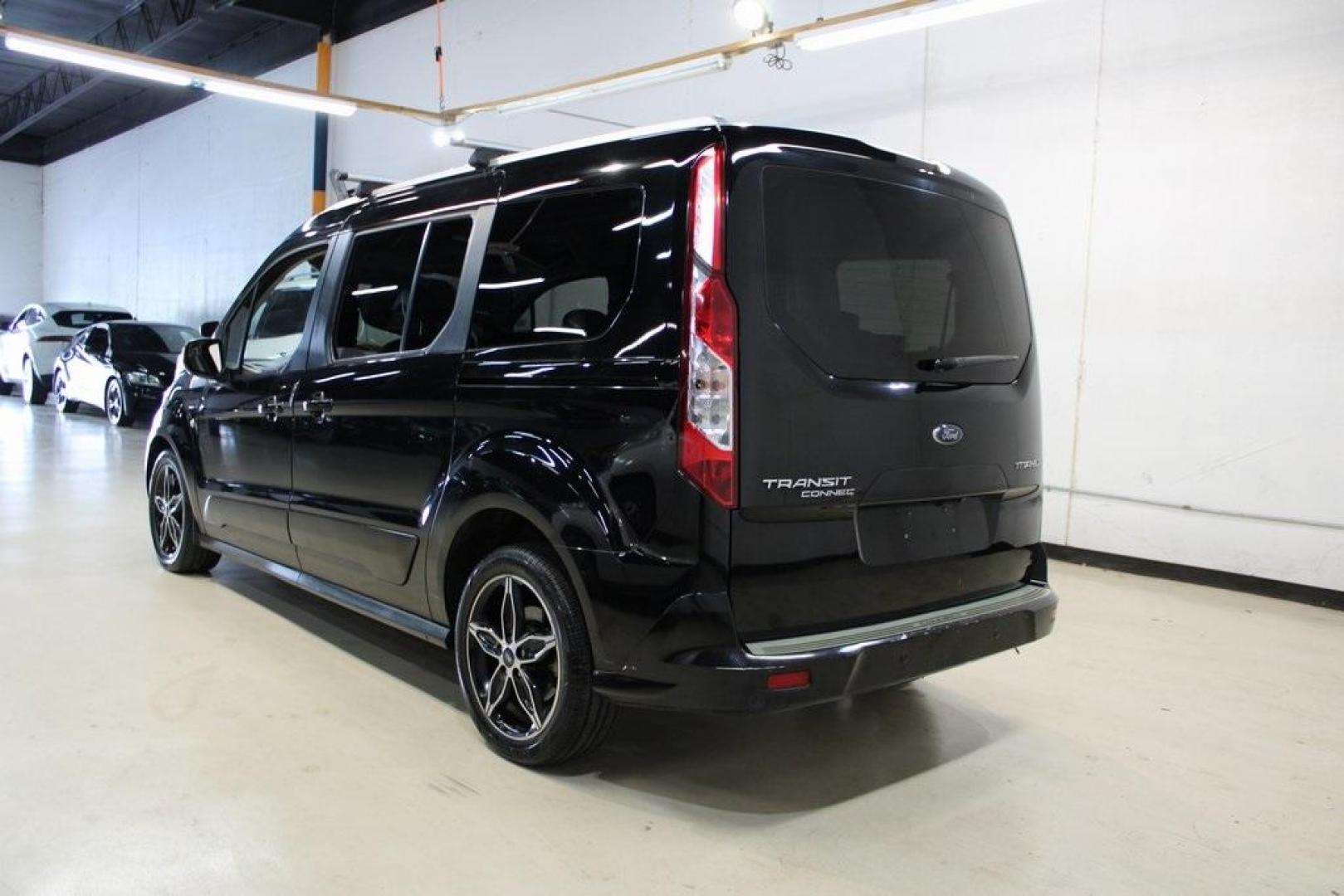 2017 Shadow Black /Medium Stone Ford Transit Connect Titanium (NM0GE9G76H1) with an Duratec 2.5L I4 engine, Automatic transmission, located at 15300 Midway Rd., Addison, TX, 75001, (972) 702-0011, 32.958321, -96.838074 - HOME OF THE NO HAGGLE PRICE - WHOLESALE PRICES TO THE PUBLIC!!<br><br>Shadow Black 2017 Ford Transit Connect Titanium<br><br>19/27 City/Highway MPG<br><br>Awards:<br> * 2017 KBB.com 10 Most Awarded Brands * 2017 KBB.com Brand Image Awards<br><br>At Midway Auto Group, we strive to provide you with - Photo#2