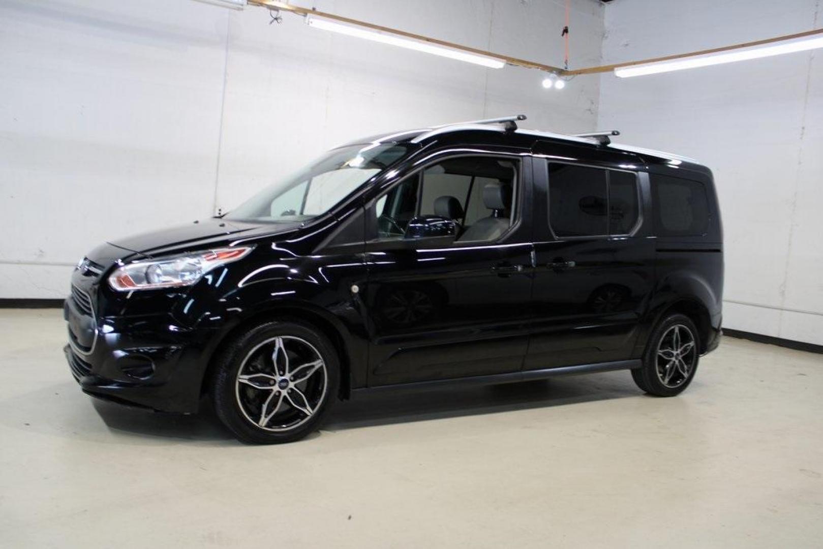 2017 Shadow Black /Medium Stone Ford Transit Connect Titanium (NM0GE9G76H1) with an Duratec 2.5L I4 engine, Automatic transmission, located at 15300 Midway Rd., Addison, TX, 75001, (972) 702-0011, 32.958321, -96.838074 - HOME OF THE NO HAGGLE PRICE - WHOLESALE PRICES TO THE PUBLIC!!<br><br>Shadow Black 2017 Ford Transit Connect Titanium<br><br>19/27 City/Highway MPG<br><br>Awards:<br> * 2017 KBB.com 10 Most Awarded Brands * 2017 KBB.com Brand Image Awards<br><br>At Midway Auto Group, we strive to provide you with - Photo#3