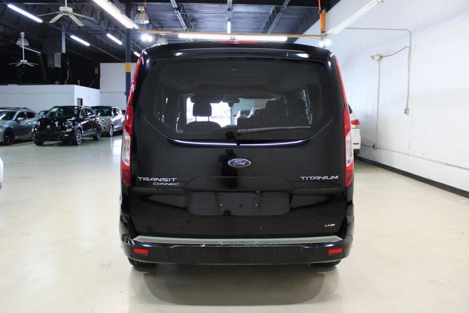 2017 Shadow Black /Medium Stone Ford Transit Connect Titanium (NM0GE9G76H1) with an Duratec 2.5L I4 engine, Automatic transmission, located at 15300 Midway Rd., Addison, TX, 75001, (972) 702-0011, 32.958321, -96.838074 - HOME OF THE NO HAGGLE PRICE - WHOLESALE PRICES TO THE PUBLIC!!<br><br>Shadow Black 2017 Ford Transit Connect Titanium<br><br>19/27 City/Highway MPG<br><br>Awards:<br> * 2017 KBB.com 10 Most Awarded Brands * 2017 KBB.com Brand Image Awards<br><br>At Midway Auto Group, we strive to provide you with - Photo#5