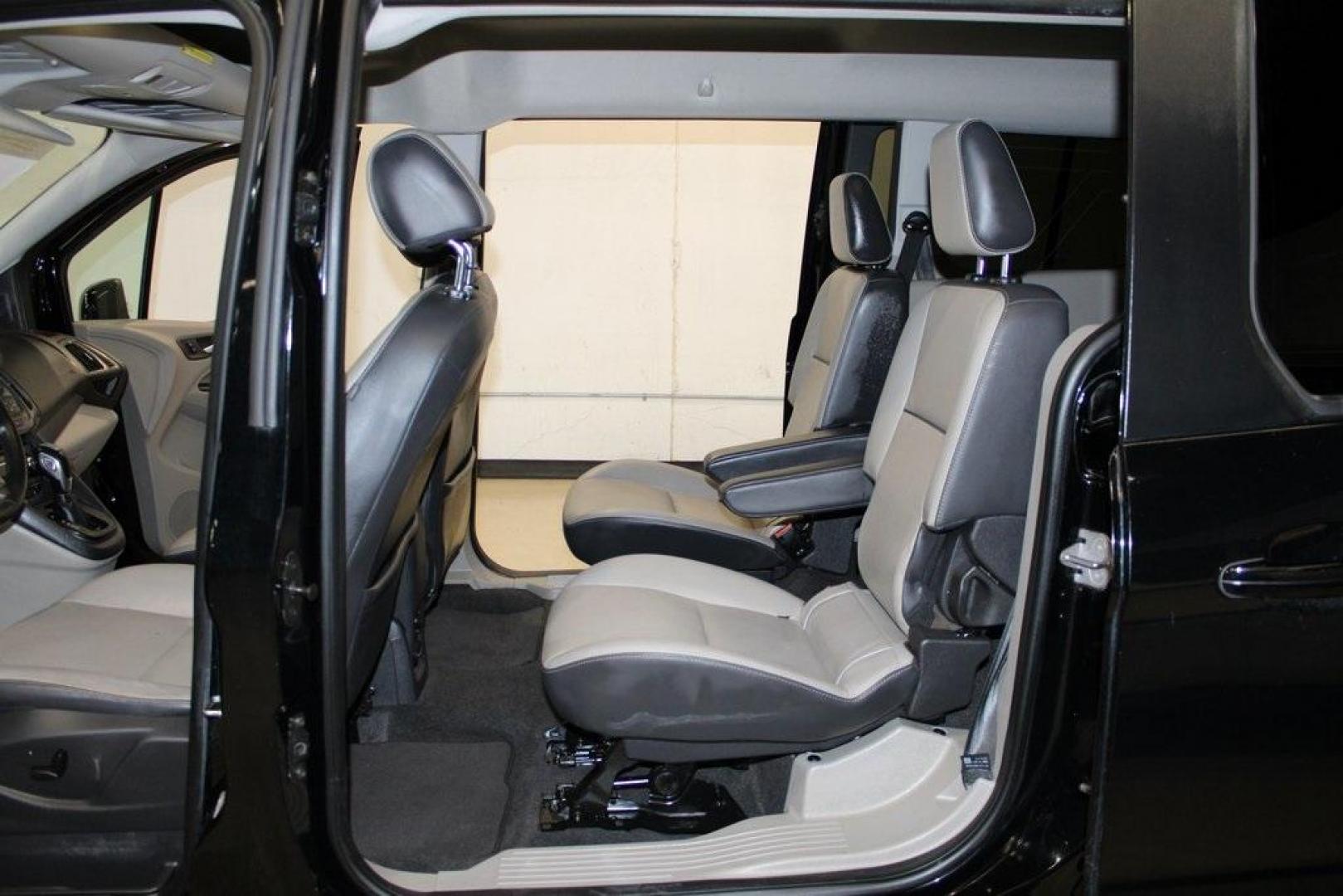 2017 Shadow Black /Medium Stone Ford Transit Connect Titanium (NM0GE9G76H1) with an Duratec 2.5L I4 engine, Automatic transmission, located at 15300 Midway Rd., Addison, TX, 75001, (972) 702-0011, 32.958321, -96.838074 - HOME OF THE NO HAGGLE PRICE - WHOLESALE PRICES TO THE PUBLIC!!<br><br>Shadow Black 2017 Ford Transit Connect Titanium<br><br>19/27 City/Highway MPG<br><br>Awards:<br> * 2017 KBB.com 10 Most Awarded Brands * 2017 KBB.com Brand Image Awards<br><br>At Midway Auto Group, we strive to provide you with - Photo#14