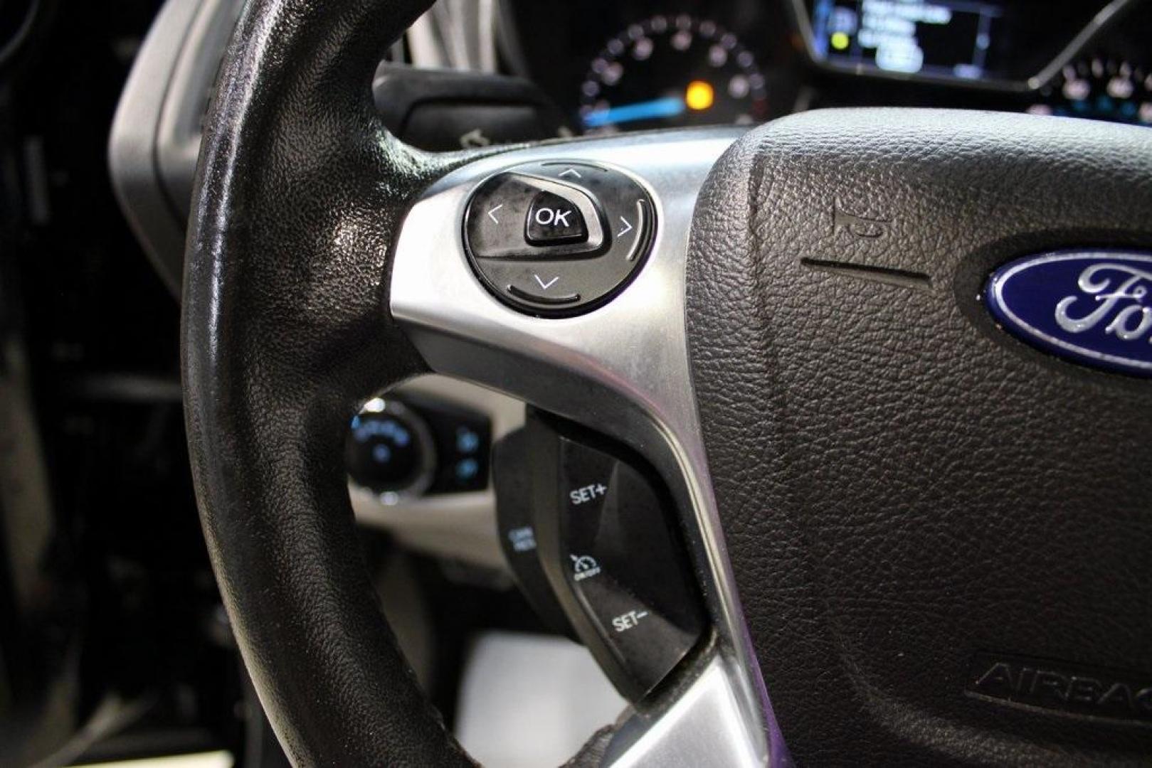 2017 Shadow Black /Medium Stone Ford Transit Connect Titanium (NM0GE9G76H1) with an Duratec 2.5L I4 engine, Automatic transmission, located at 15300 Midway Rd., Addison, TX, 75001, (972) 702-0011, 32.958321, -96.838074 - HOME OF THE NO HAGGLE PRICE - WHOLESALE PRICES TO THE PUBLIC!!<br><br>Shadow Black 2017 Ford Transit Connect Titanium<br><br>19/27 City/Highway MPG<br><br>Awards:<br> * 2017 KBB.com 10 Most Awarded Brands * 2017 KBB.com Brand Image Awards<br><br>At Midway Auto Group, we strive to provide you with - Photo#24
