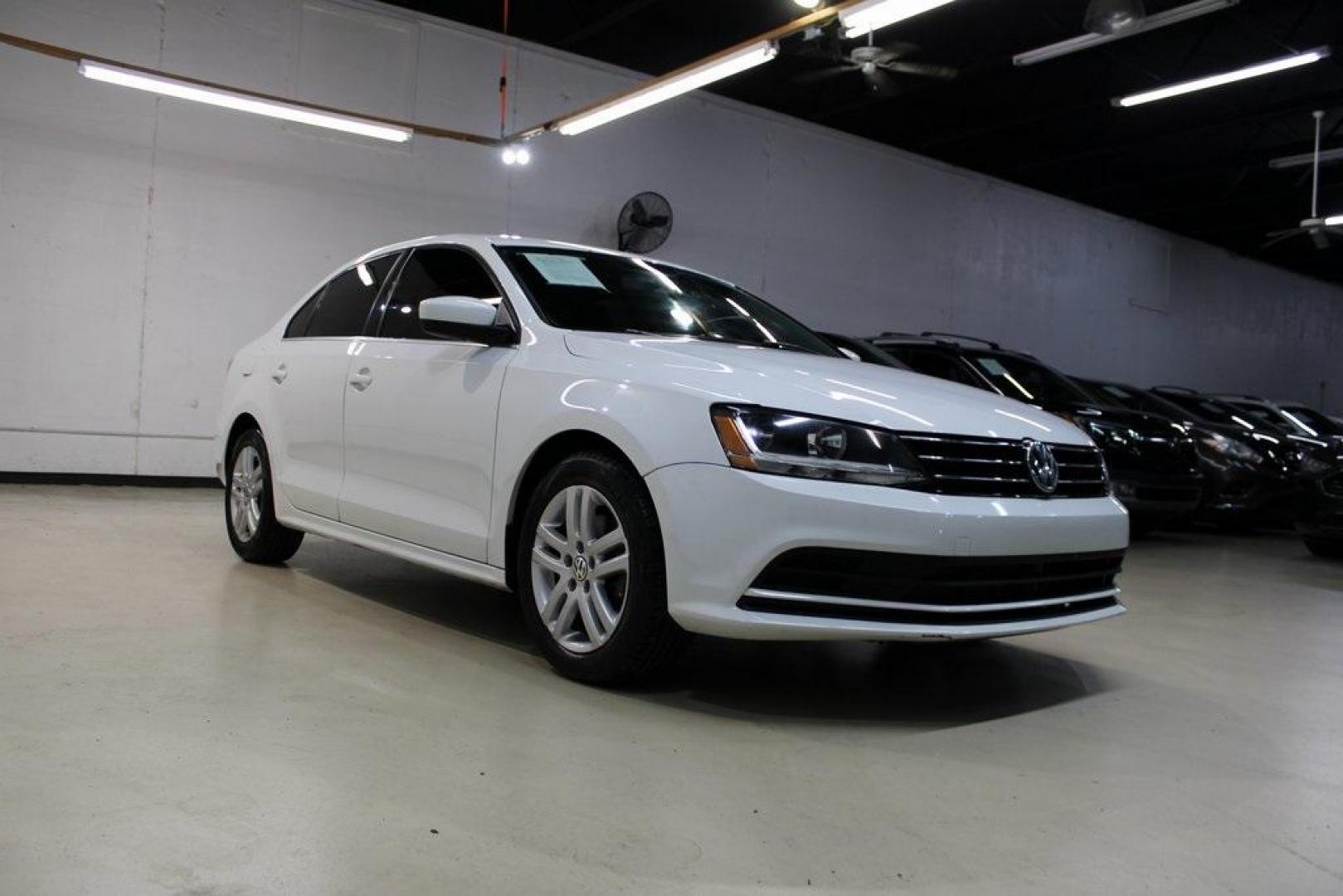 2017 White /Titan Black Volkswagen Jetta 1.4T S (3VW2B7AJ6HM) with an 1.4L TSI engine, Automatic transmission, located at 15300 Midway Rd., Addison, TX, 75001, (972) 702-0011, 32.958321, -96.838074 - HOME OF THE NO HAGGLE PRICE - WHOLESALE PRICES TO THE PUBLIC!!<br><br>White 2017 Volkswagen Jetta 1.4T S<br><br>28/38 City/Highway MPG<br><br>Awards:<br> * 2017 IIHS Top Safety Pick+ * 2017 KBB.com 10 Best Used Compact Cars Under $15,000 * 2017 KBB.com 10 Coolest New Cars Under $18,000<br><br>A - Photo#1