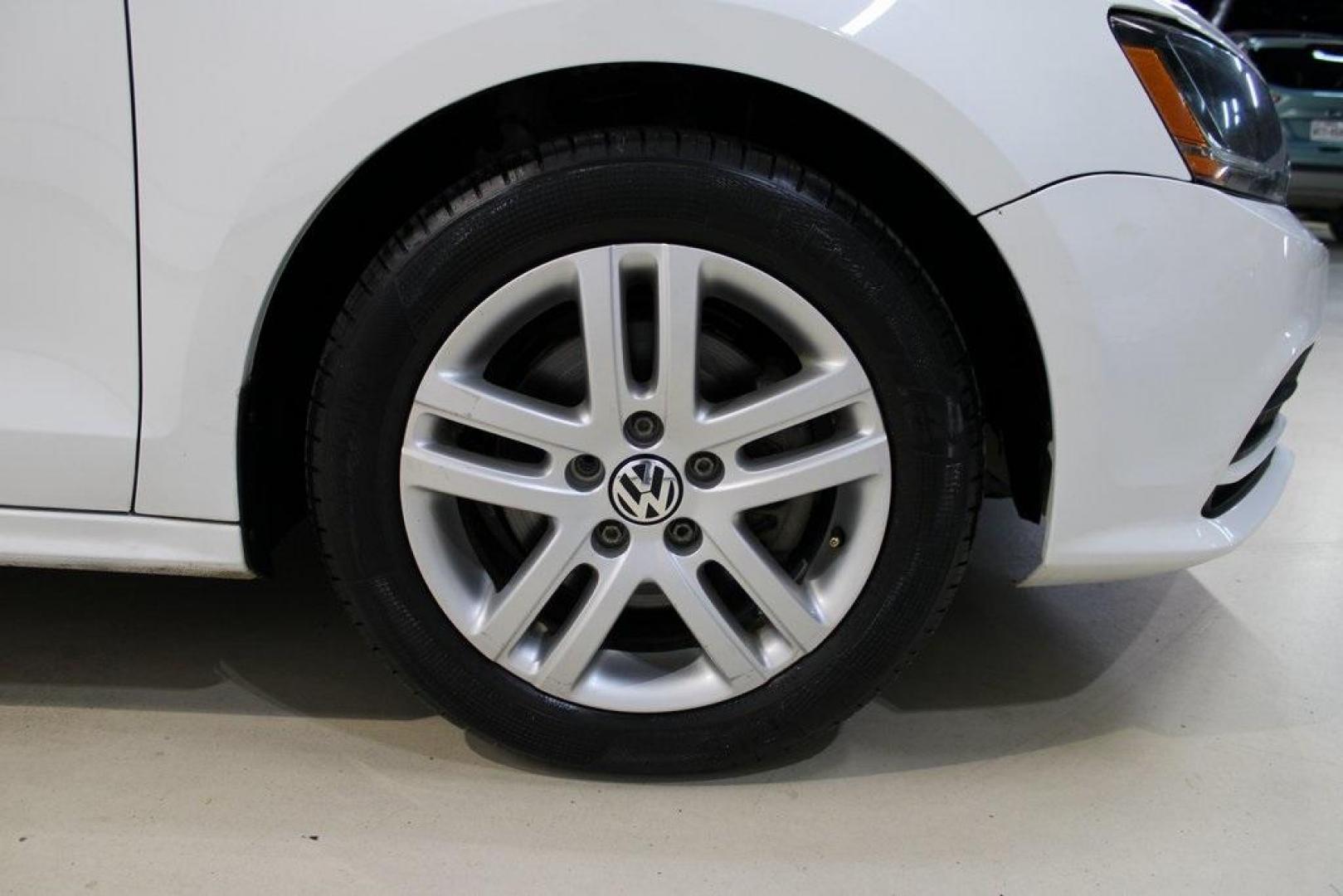 2017 White /Titan Black Volkswagen Jetta 1.4T S (3VW2B7AJ6HM) with an 1.4L TSI engine, Automatic transmission, located at 15300 Midway Rd., Addison, TX, 75001, (972) 702-0011, 32.958321, -96.838074 - HOME OF THE NO HAGGLE PRICE - WHOLESALE PRICES TO THE PUBLIC!!<br><br>White 2017 Volkswagen Jetta 1.4T S<br><br>28/38 City/Highway MPG<br><br>Awards:<br> * 2017 IIHS Top Safety Pick+ * 2017 KBB.com 10 Best Used Compact Cars Under $15,000 * 2017 KBB.com 10 Coolest New Cars Under $18,000<br><br>A - Photo#9