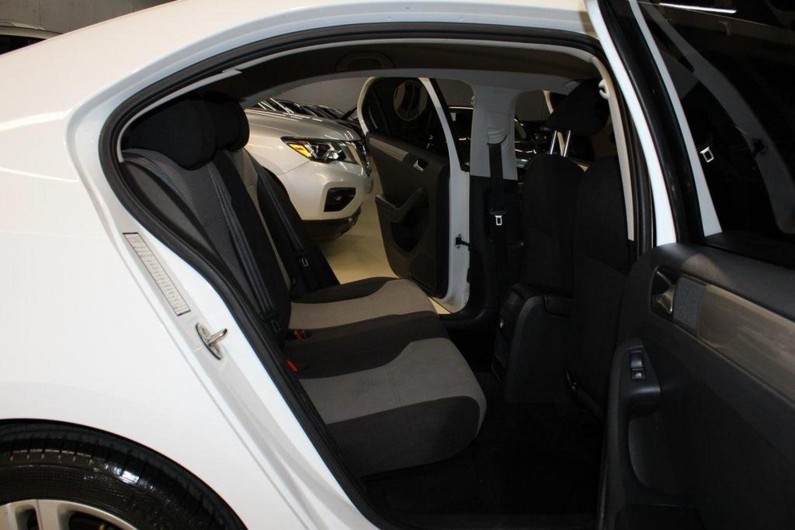 2017 White /Titan Black Volkswagen Jetta 1.4T S (3VW2B7AJ6HM) with an 1.4L TSI engine, Automatic transmission, located at 15300 Midway Rd., Addison, TX, 75001, (972) 702-0011, 32.958321, -96.838074 - HOME OF THE NO HAGGLE PRICE - WHOLESALE PRICES TO THE PUBLIC!!<br><br>White 2017 Volkswagen Jetta 1.4T S<br><br>28/38 City/Highway MPG<br><br>Awards:<br> * 2017 IIHS Top Safety Pick+ * 2017 KBB.com 10 Best Used Compact Cars Under $15,000 * 2017 KBB.com 10 Coolest New Cars Under $18,000<br><br>A - Photo#12