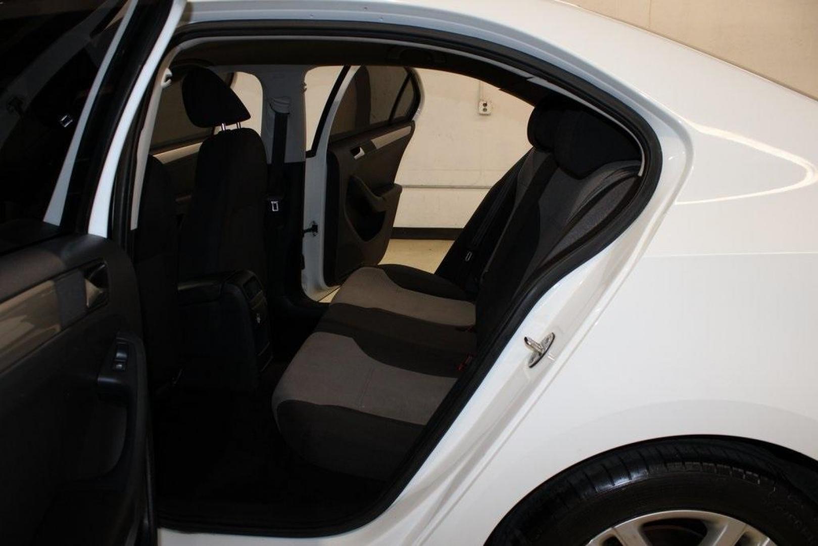 2017 White /Titan Black Volkswagen Jetta 1.4T S (3VW2B7AJ6HM) with an 1.4L TSI engine, Automatic transmission, located at 15300 Midway Rd., Addison, TX, 75001, (972) 702-0011, 32.958321, -96.838074 - HOME OF THE NO HAGGLE PRICE - WHOLESALE PRICES TO THE PUBLIC!!<br><br>White 2017 Volkswagen Jetta 1.4T S<br><br>28/38 City/Highway MPG<br><br>Awards:<br> * 2017 IIHS Top Safety Pick+ * 2017 KBB.com 10 Best Used Compact Cars Under $15,000 * 2017 KBB.com 10 Coolest New Cars Under $18,000<br><br>A - Photo#13