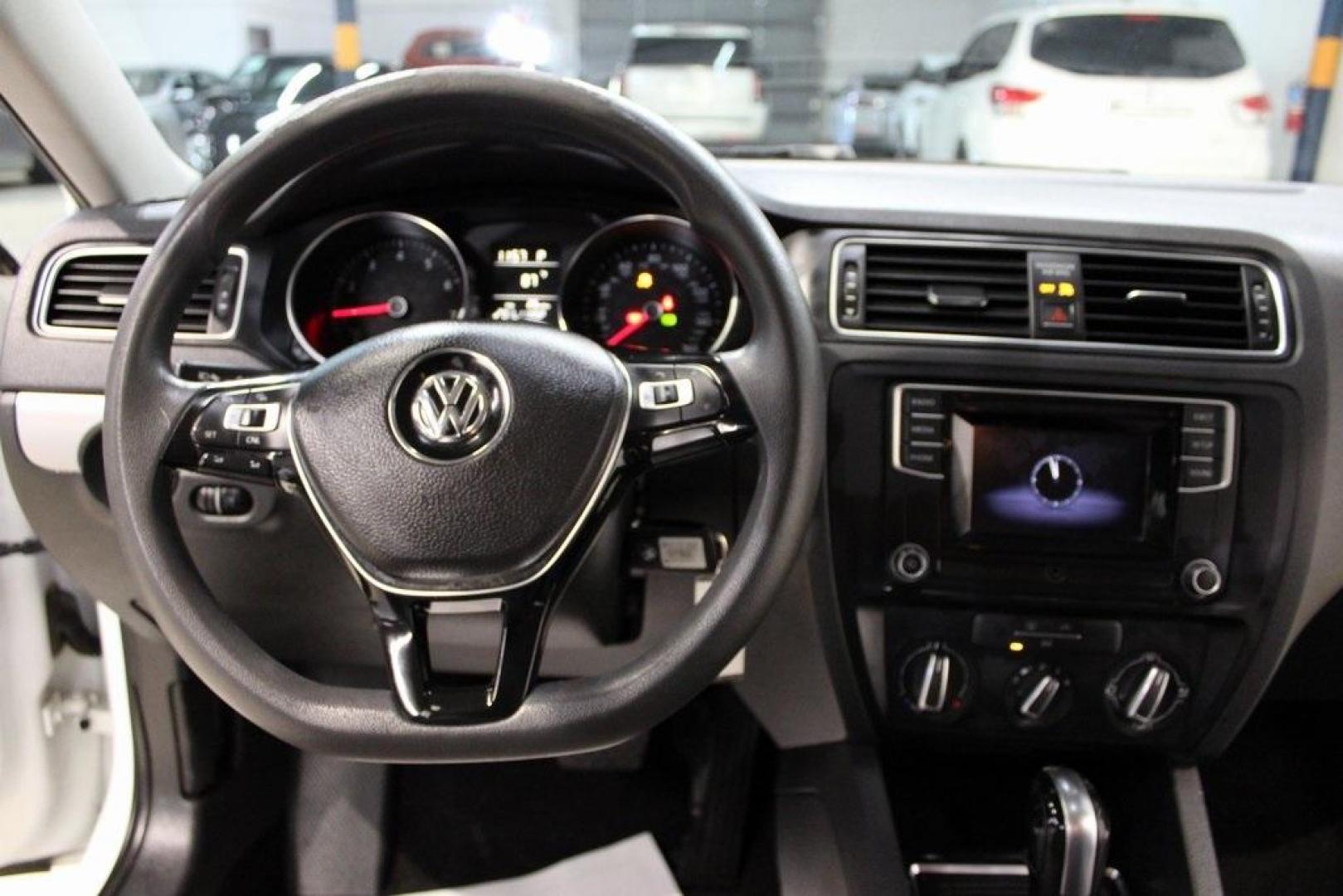 2017 White /Titan Black Volkswagen Jetta 1.4T S (3VW2B7AJ6HM) with an 1.4L TSI engine, Automatic transmission, located at 15300 Midway Rd., Addison, TX, 75001, (972) 702-0011, 32.958321, -96.838074 - HOME OF THE NO HAGGLE PRICE - WHOLESALE PRICES TO THE PUBLIC!!<br><br>White 2017 Volkswagen Jetta 1.4T S<br><br>28/38 City/Highway MPG<br><br>Awards:<br> * 2017 IIHS Top Safety Pick+ * 2017 KBB.com 10 Best Used Compact Cars Under $15,000 * 2017 KBB.com 10 Coolest New Cars Under $18,000<br><br>A - Photo#14