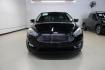2018 Shadow Black /Medium Soft Ceramic Ford Focus Titanium (1FADP3N21JL) with an 2.0L I4 DGI Ti-VCT engine, Automatic transmission, located at 15300 Midway Rd., Addison, TX, 75001, (972) 702-0011, 32.958321, -96.838074 - HOME OF THE NO HAGGLE PRICE - WHOLESALE PRICES TO THE PUBLIC!!<br><br>Shadow Black 2018 Ford Focus Titanium<br><br>24/34 City/Highway MPG<br><br>Awards:<br> * 2018 KBB.com 10 Most Awarded Brands * 2018 KBB.com Brand Image Awards<br><br>At Midway Auto Group, we strive to provide you with the best - Photo#5