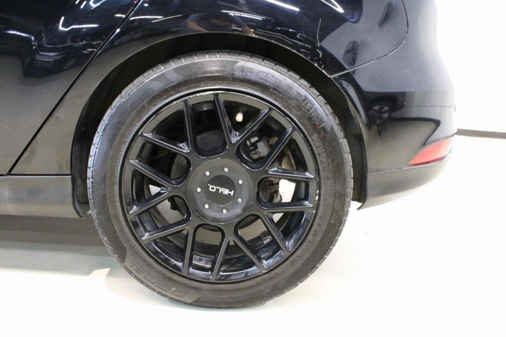 2018 Shadow Black /Medium Soft Ceramic Ford Focus Titanium (1FADP3N21JL) with an 2.0L I4 DGI Ti-VCT engine, Automatic transmission, located at 15300 Midway Rd., Addison, TX, 75001, (972) 702-0011, 32.958321, -96.838074 - HOME OF THE NO HAGGLE PRICE - WHOLESALE PRICES TO THE PUBLIC!!<br><br>Shadow Black 2018 Ford Focus Titanium<br><br>24/34 City/Highway MPG<br><br>Awards:<br> * 2018 KBB.com 10 Most Awarded Brands * 2018 KBB.com Brand Image Awards<br><br>At Midway Auto Group, we strive to provide you with the best - Photo#9