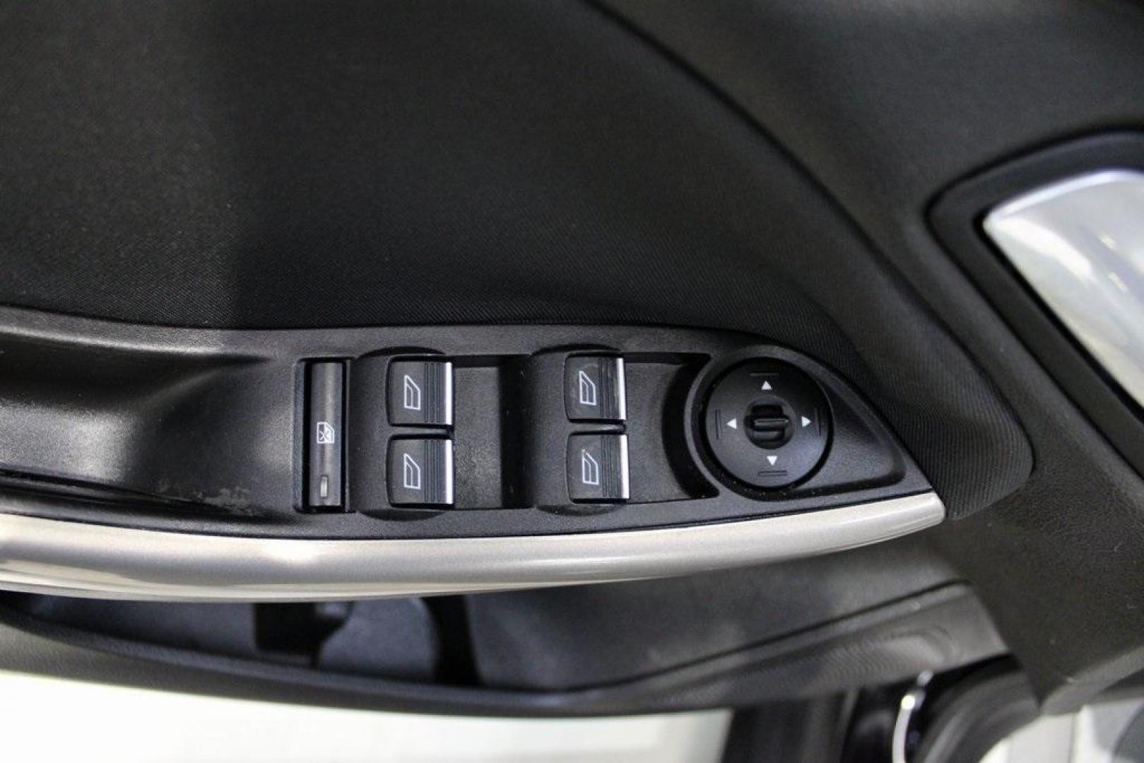 2018 Shadow Black /Medium Soft Ceramic Ford Focus Titanium (1FADP3N21JL) with an 2.0L I4 DGI Ti-VCT engine, Automatic transmission, located at 15300 Midway Rd., Addison, TX, 75001, (972) 702-0011, 32.958321, -96.838074 - HOME OF THE NO HAGGLE PRICE - WHOLESALE PRICES TO THE PUBLIC!!<br><br>Shadow Black 2018 Ford Focus Titanium<br><br>24/34 City/Highway MPG<br><br>Awards:<br> * 2018 KBB.com 10 Most Awarded Brands * 2018 KBB.com Brand Image Awards<br><br>At Midway Auto Group, we strive to provide you with the best - Photo#27