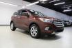 2018 Cinnamon Glaze /Charcoal Black Ford Escape SE (1FMCU0GD6JU) with an EcoBoost 2.0L I4 GTDi DOHC Turbocharged VCT engine, Automatic transmission, located at 15300 Midway Rd., Addison, TX, 75001, (972) 702-0011, 32.958321, -96.838074 - HOME OF THE NO HAGGLE PRICE - WHOLESALE PRICES TO THE PUBLIC!!<br><br>Cinnamon Glaze 2018 Ford Escape SE<br><br>23/30 City/Highway MPG<br><br>Awards:<br> * 2018 KBB.com 10 Most Awarded Brands * 2018 KBB.com Brand Image Awards<br><br>At Midway Auto Group, we strive to provide you with the best qua - Photo#1