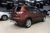 2018 Cinnamon Glaze /Charcoal Black Ford Escape SE (1FMCU0GD6JU) with an EcoBoost 2.0L I4 GTDi DOHC Turbocharged VCT engine, Automatic transmission, located at 15300 Midway Rd., Addison, TX, 75001, (972) 702-0011, 32.958321, -96.838074 - HOME OF THE NO HAGGLE PRICE - WHOLESALE PRICES TO THE PUBLIC!!<br><br>Cinnamon Glaze 2018 Ford Escape SE<br><br>23/30 City/Highway MPG<br><br>Awards:<br> * 2018 KBB.com 10 Most Awarded Brands * 2018 KBB.com Brand Image Awards<br><br>At Midway Auto Group, we strive to provide you with the best qua - Photo#2