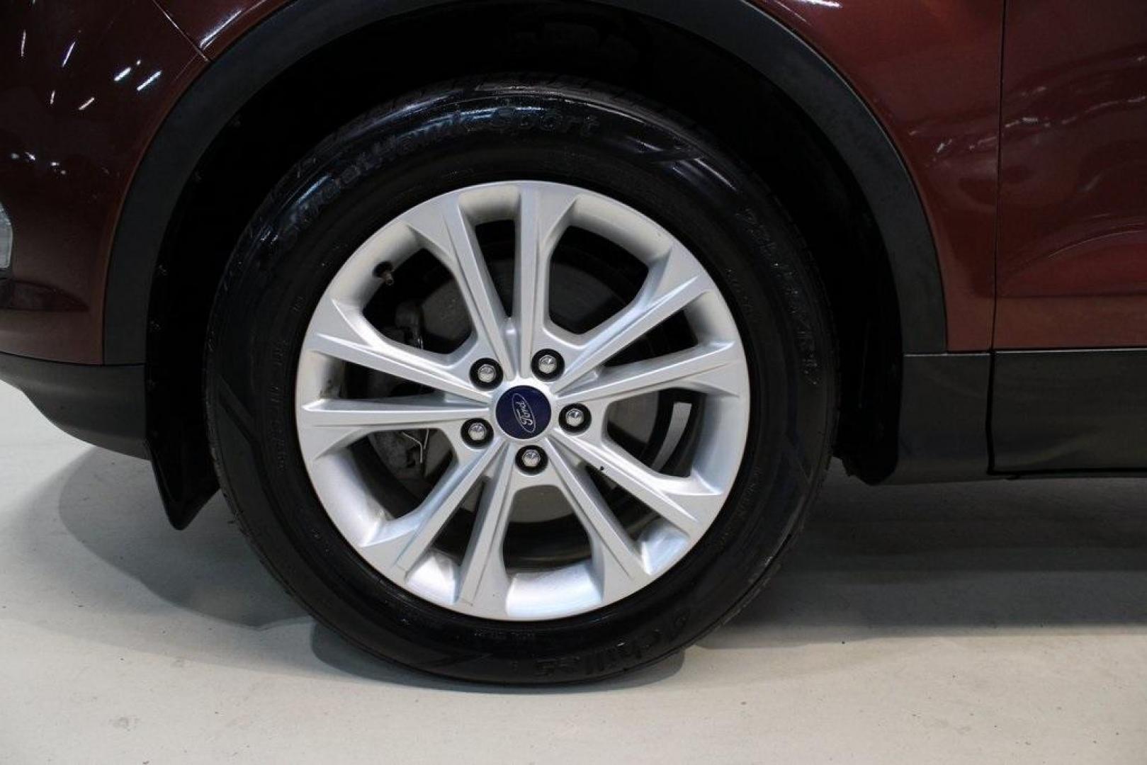 2018 Cinnamon Glaze /Charcoal Black Ford Escape SE (1FMCU0GD6JU) with an EcoBoost 2.0L I4 GTDi DOHC Turbocharged VCT engine, Automatic transmission, located at 15300 Midway Rd., Addison, TX, 75001, (972) 702-0011, 32.958321, -96.838074 - HOME OF THE NO HAGGLE PRICE - WHOLESALE PRICES TO THE PUBLIC!!<br><br>Cinnamon Glaze 2018 Ford Escape SE<br><br>23/30 City/Highway MPG<br><br>Awards:<br> * 2018 KBB.com 10 Most Awarded Brands * 2018 KBB.com Brand Image Awards<br><br>At Midway Auto Group, we strive to provide you with the best qua - Photo#8