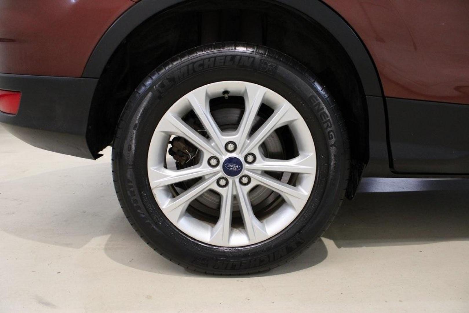 2018 Cinnamon Glaze /Charcoal Black Ford Escape SE (1FMCU0GD6JU) with an EcoBoost 2.0L I4 GTDi DOHC Turbocharged VCT engine, Automatic transmission, located at 15300 Midway Rd., Addison, TX, 75001, (972) 702-0011, 32.958321, -96.838074 - HOME OF THE NO HAGGLE PRICE - WHOLESALE PRICES TO THE PUBLIC!!<br><br>Cinnamon Glaze 2018 Ford Escape SE<br><br>23/30 City/Highway MPG<br><br>Awards:<br> * 2018 KBB.com 10 Most Awarded Brands * 2018 KBB.com Brand Image Awards<br><br>At Midway Auto Group, we strive to provide you with the best qua - Photo#10