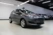 2019 Magnetic /Black Ford Fiesta SE (3FADP4EJ7KM) with an 1.6L I4 Ti-VCT engine, Automatic transmission, located at 15300 Midway Rd., Addison, TX, 75001, (972) 702-0011, 32.958321, -96.838074 - HOME OF THE NO HAGGLE PRICE - WHOLESALE PRICES TO THE PUBLIC!!<br><br>Magnetic 2019 Ford Fiesta SE<br><br>Recent Arrival! 27/37 City/Highway MPG<br><br><br>At Midway Auto Group, we strive to provide you with the best quality vehicles for the lowest possible price, and this 2019 Ford Fiesta is no exc - Photo#1