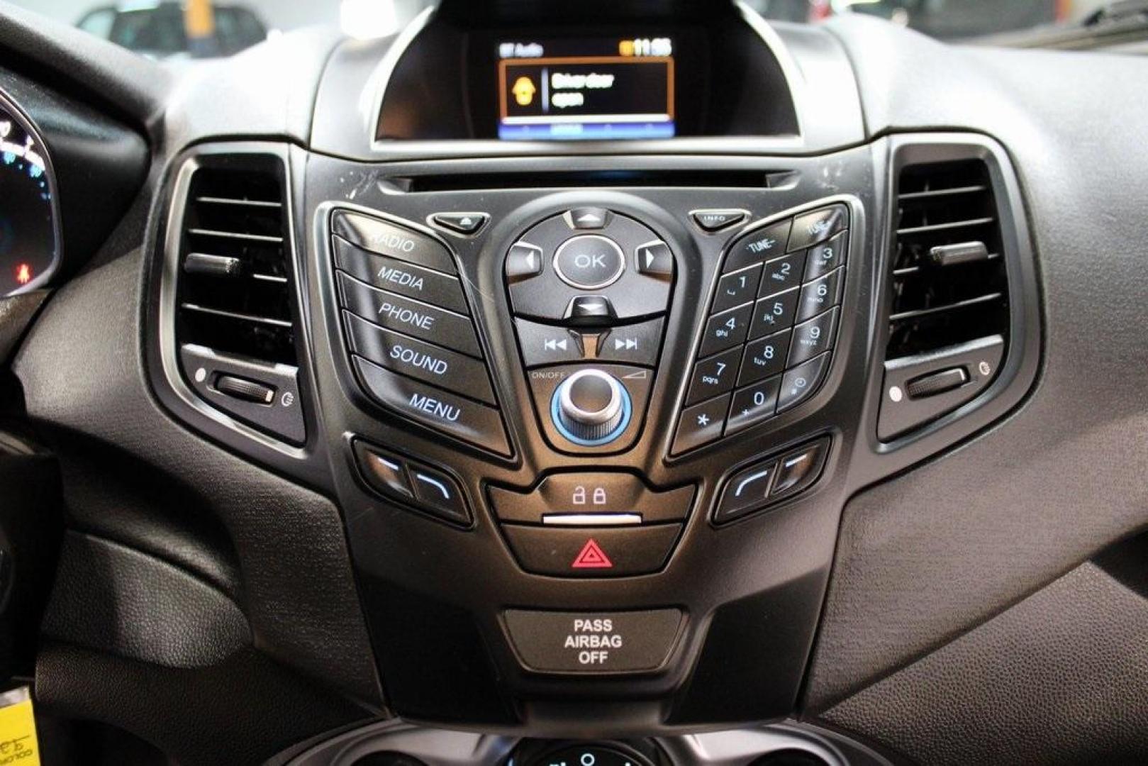 2019 Magnetic /Black Ford Fiesta SE (3FADP4EJ7KM) with an 1.6L I4 Ti-VCT engine, Automatic transmission, located at 15300 Midway Rd., Addison, TX, 75001, (972) 702-0011, 32.958321, -96.838074 - HOME OF THE NO HAGGLE PRICE - WHOLESALE PRICES TO THE PUBLIC!!<br><br>Magnetic 2019 Ford Fiesta SE<br><br>Recent Arrival! 27/37 City/Highway MPG<br><br><br>At Midway Auto Group, we strive to provide you with the best quality vehicles for the lowest possible price, and this 2019 Ford Fiesta is no exc - Photo#19