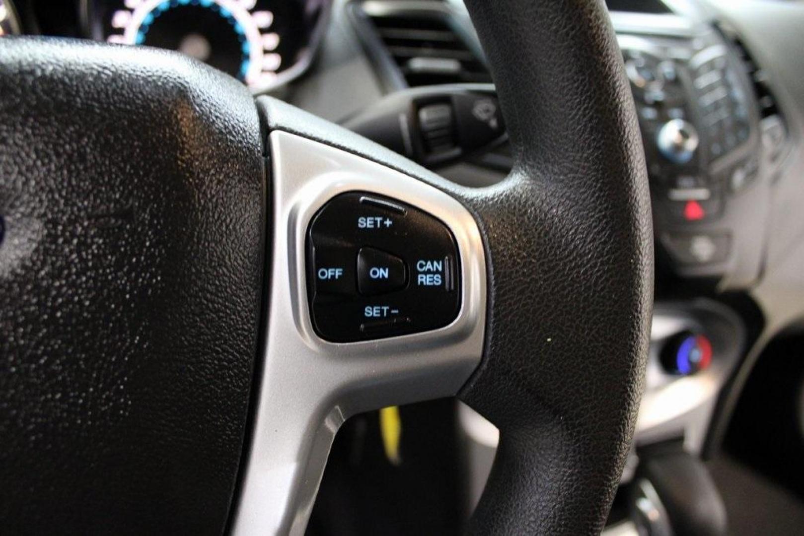 2019 Magnetic /Black Ford Fiesta SE (3FADP4EJ7KM) with an 1.6L I4 Ti-VCT engine, Automatic transmission, located at 15300 Midway Rd., Addison, TX, 75001, (972) 702-0011, 32.958321, -96.838074 - HOME OF THE NO HAGGLE PRICE - WHOLESALE PRICES TO THE PUBLIC!!<br><br>Magnetic 2019 Ford Fiesta SE<br><br>Recent Arrival! 27/37 City/Highway MPG<br><br><br>At Midway Auto Group, we strive to provide you with the best quality vehicles for the lowest possible price, and this 2019 Ford Fiesta is no exc - Photo#22