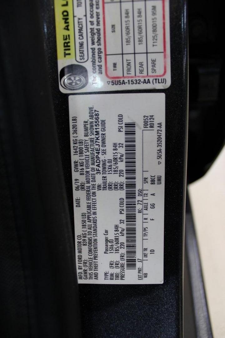2019 Magnetic /Black Ford Fiesta SE (3FADP4EJ7KM) with an 1.6L I4 Ti-VCT engine, Automatic transmission, located at 15300 Midway Rd., Addison, TX, 75001, (972) 702-0011, 32.958321, -96.838074 - HOME OF THE NO HAGGLE PRICE - WHOLESALE PRICES TO THE PUBLIC!!<br><br>Magnetic 2019 Ford Fiesta SE<br><br>Recent Arrival! 27/37 City/Highway MPG<br><br><br>At Midway Auto Group, we strive to provide you with the best quality vehicles for the lowest possible price, and this 2019 Ford Fiesta is no exc - Photo#26