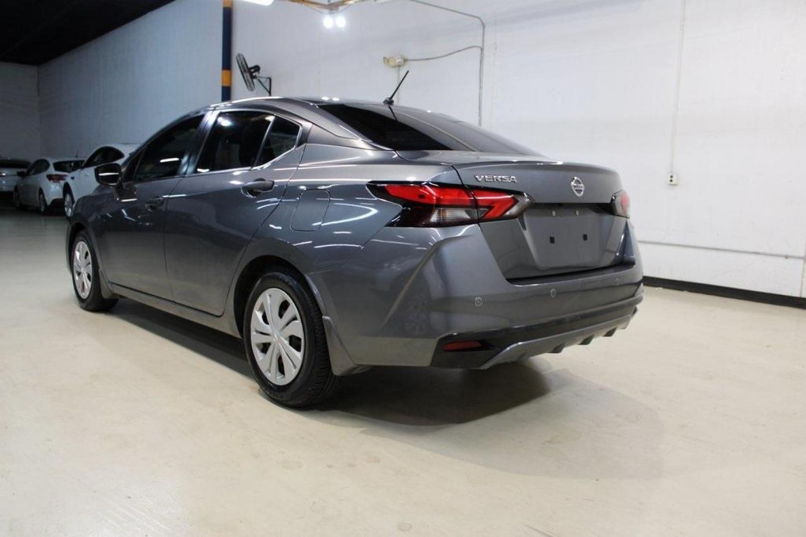 2021 Gun Metallic /Charcoal Nissan Versa 1.6 S (3N1CN8DV1ML) with an 1.6L 4-Cylinder DOHC 16V engine, CVT transmission, located at 15300 Midway Rd., Addison, TX, 75001, (972) 702-0011, 32.958321, -96.838074 - Photo#3