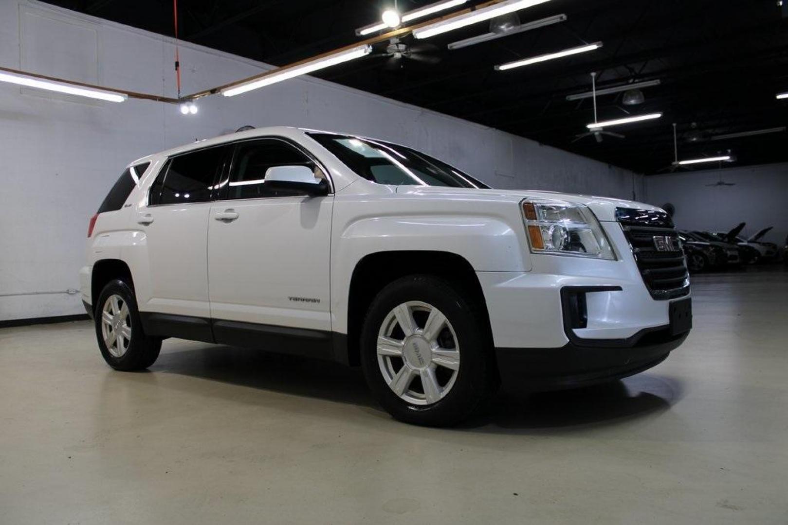 2016 White Frost Tricoat /Jet Black GMC Terrain SLE-1 (2GKALMEK7G6) with an 2.4L 4-Cylinder SIDI DOHC VVT engine, Automatic transmission, located at 15300 Midway Rd., Addison, TX, 75001, (972) 702-0011, 32.958321, -96.838074 - HOME OF THE NO HAGGLE PRICE - WHOLESALE PRICES TO THE PUBLIC!! Odometer is 24603 miles below market average!<br><br>White Frost Tricoat 2016 GMC Terrain SLE-1<br><br>22/32 City/Highway MPG<br><br>Awards:<br> * JD Power Initial Quality Study (IQS) * 2016 IIHS Top Safety Pick * 2016 IIHS Top Safe - Photo#7