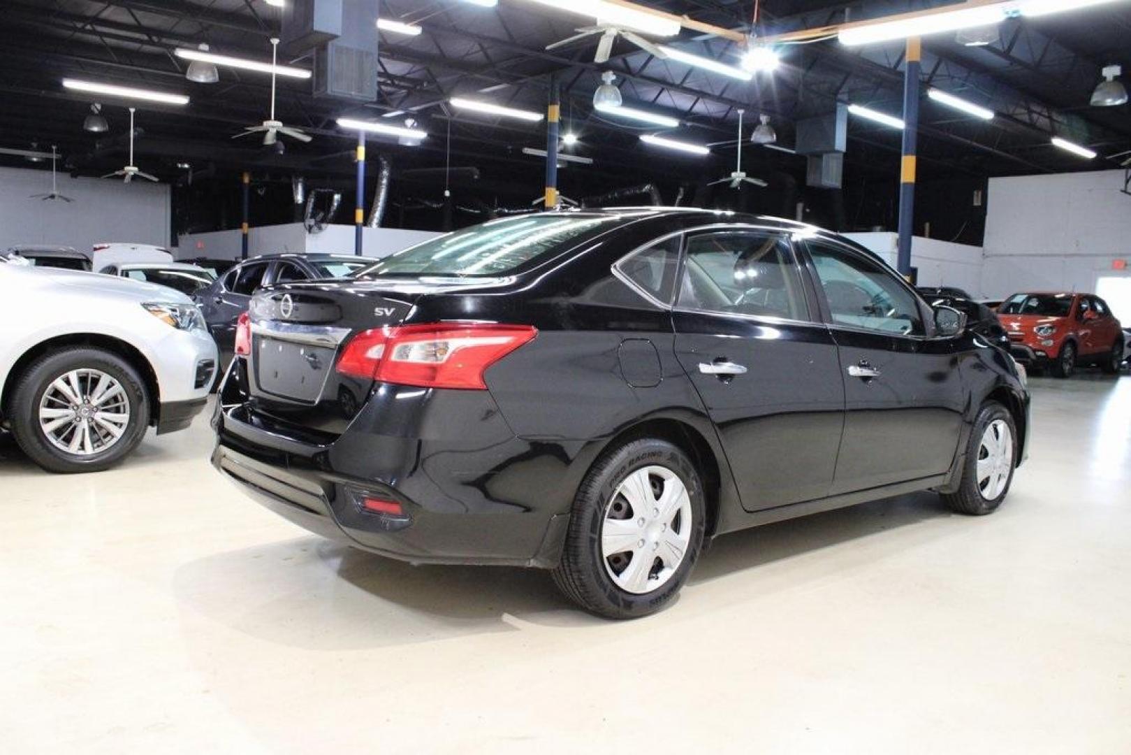 2017 Super Black /Charcoal Nissan Sentra SV (3N1AB7AP0HL) with an 1.8L 4-Cylinder DOHC 16V engine, CVT transmission, located at 15300 Midway Rd., Addison, TX, 75001, (972) 702-0011, 32.958321, -96.838074 - HOME OF THE NO HAGGLE PRICE - WHOLESALE PRICES TO THE PUBLIC!! Odometer is 13698 miles below market average!Super Black 2017 Nissan Sentra SVRecent Arrival! 29/37 City/Highway MPGAt Midway Auto Group, we strive to provide you with the best quality vehicles for the lowest possible price, and this 201 - Photo#2