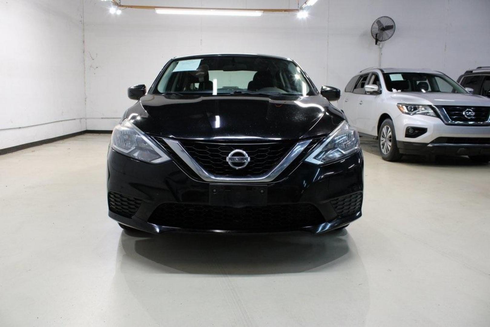 2017 Super Black /Charcoal Nissan Sentra SV (3N1AB7AP0HL) with an 1.8L 4-Cylinder DOHC 16V engine, CVT transmission, located at 15300 Midway Rd., Addison, TX, 75001, (972) 702-0011, 32.958321, -96.838074 - HOME OF THE NO HAGGLE PRICE - WHOLESALE PRICES TO THE PUBLIC!! Odometer is 13698 miles below market average!Super Black 2017 Nissan Sentra SVRecent Arrival! 29/37 City/Highway MPGAt Midway Auto Group, we strive to provide you with the best quality vehicles for the lowest possible price, and this 201 - Photo#5