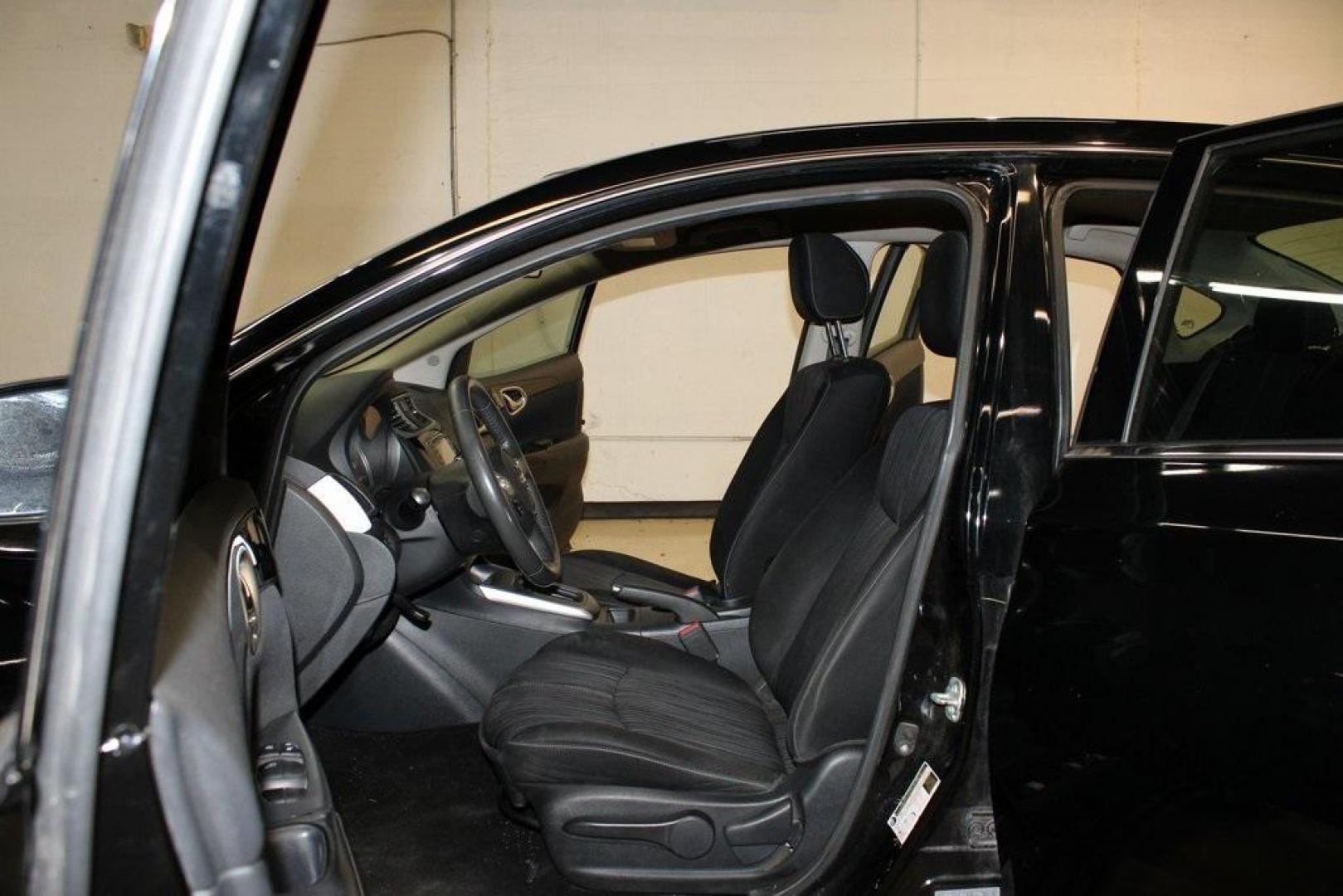 2017 Super Black /Charcoal Nissan Sentra SV (3N1AB7AP0HL) with an 1.8L 4-Cylinder DOHC 16V engine, CVT transmission, located at 15300 Midway Rd., Addison, TX, 75001, (972) 702-0011, 32.958321, -96.838074 - HOME OF THE NO HAGGLE PRICE - WHOLESALE PRICES TO THE PUBLIC!! Odometer is 13698 miles below market average!Super Black 2017 Nissan Sentra SVRecent Arrival! 29/37 City/Highway MPGAt Midway Auto Group, we strive to provide you with the best quality vehicles for the lowest possible price, and this 201 - Photo#12