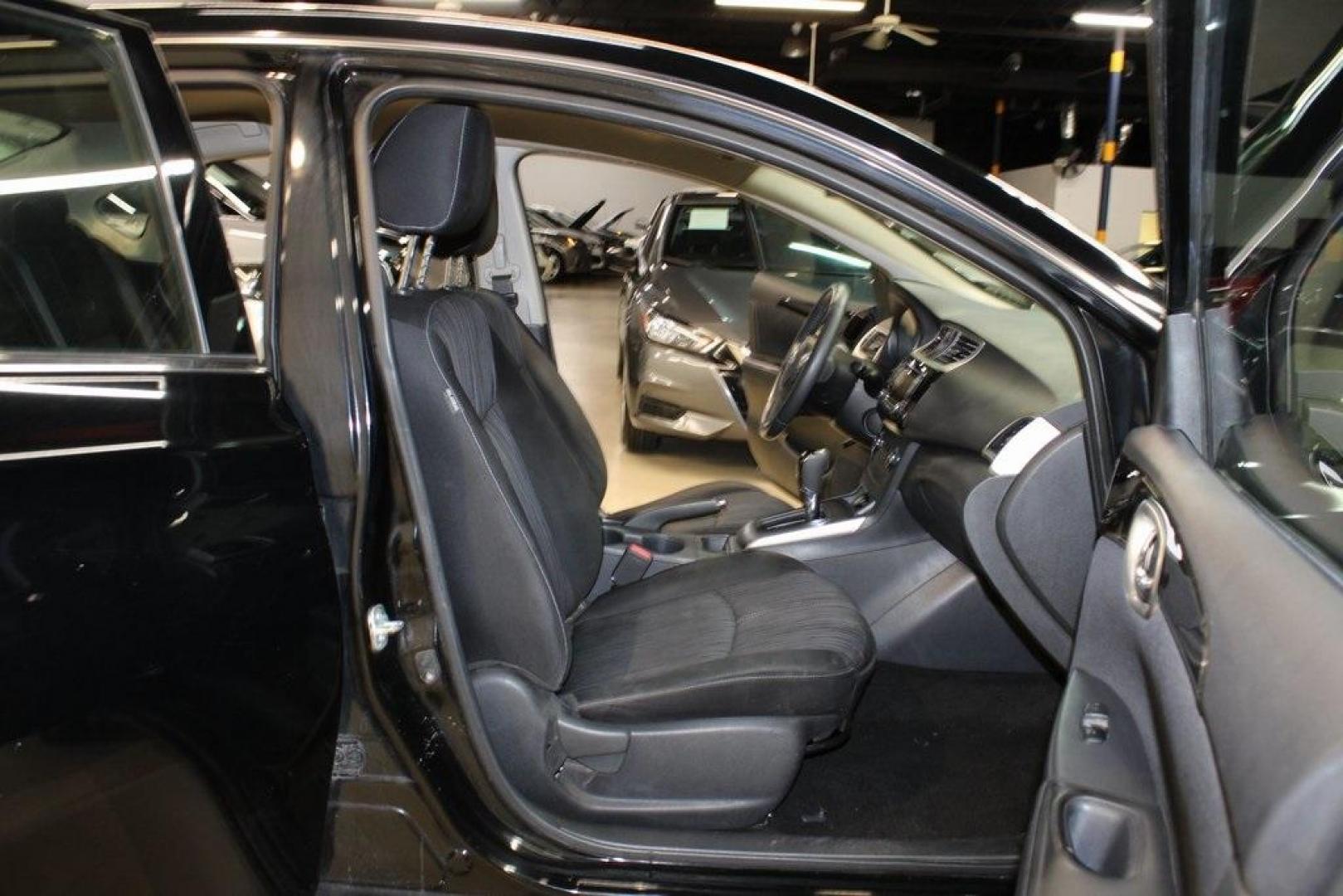 2017 Super Black /Charcoal Nissan Sentra SV (3N1AB7AP0HL) with an 1.8L 4-Cylinder DOHC 16V engine, CVT transmission, located at 15300 Midway Rd., Addison, TX, 75001, (972) 702-0011, 32.958321, -96.838074 - HOME OF THE NO HAGGLE PRICE - WHOLESALE PRICES TO THE PUBLIC!! Odometer is 13698 miles below market average!Super Black 2017 Nissan Sentra SVRecent Arrival! 29/37 City/Highway MPGAt Midway Auto Group, we strive to provide you with the best quality vehicles for the lowest possible price, and this 201 - Photo#13