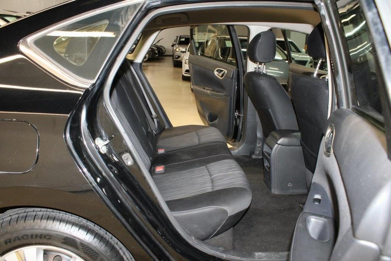 2017 Super Black /Charcoal Nissan Sentra SV (3N1AB7AP0HL) with an 1.8L 4-Cylinder DOHC 16V engine, CVT transmission, located at 15300 Midway Rd., Addison, TX, 75001, (972) 702-0011, 32.958321, -96.838074 - HOME OF THE NO HAGGLE PRICE - WHOLESALE PRICES TO THE PUBLIC!! Odometer is 13698 miles below market average!Super Black 2017 Nissan Sentra SVRecent Arrival! 29/37 City/Highway MPGAt Midway Auto Group, we strive to provide you with the best quality vehicles for the lowest possible price, and this 201 - Photo#14