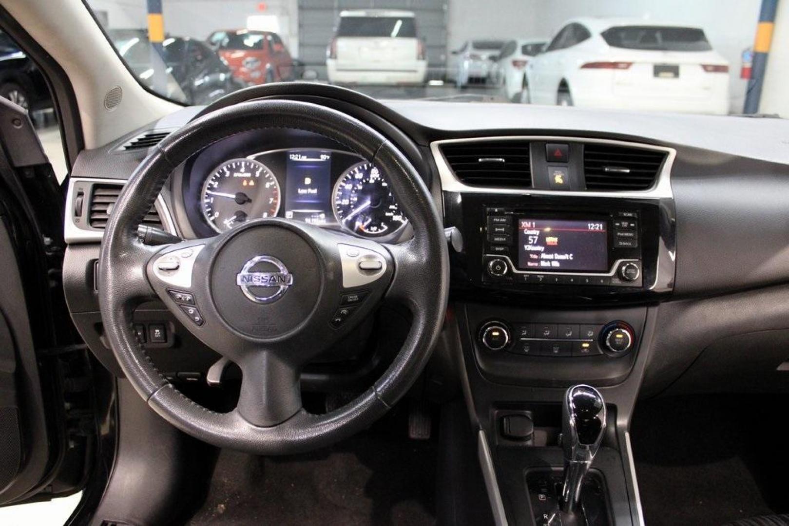 2017 Super Black /Charcoal Nissan Sentra SV (3N1AB7AP0HL) with an 1.8L 4-Cylinder DOHC 16V engine, CVT transmission, located at 15300 Midway Rd., Addison, TX, 75001, (972) 702-0011, 32.958321, -96.838074 - HOME OF THE NO HAGGLE PRICE - WHOLESALE PRICES TO THE PUBLIC!! Odometer is 13698 miles below market average!Super Black 2017 Nissan Sentra SVRecent Arrival! 29/37 City/Highway MPGAt Midway Auto Group, we strive to provide you with the best quality vehicles for the lowest possible price, and this 201 - Photo#16