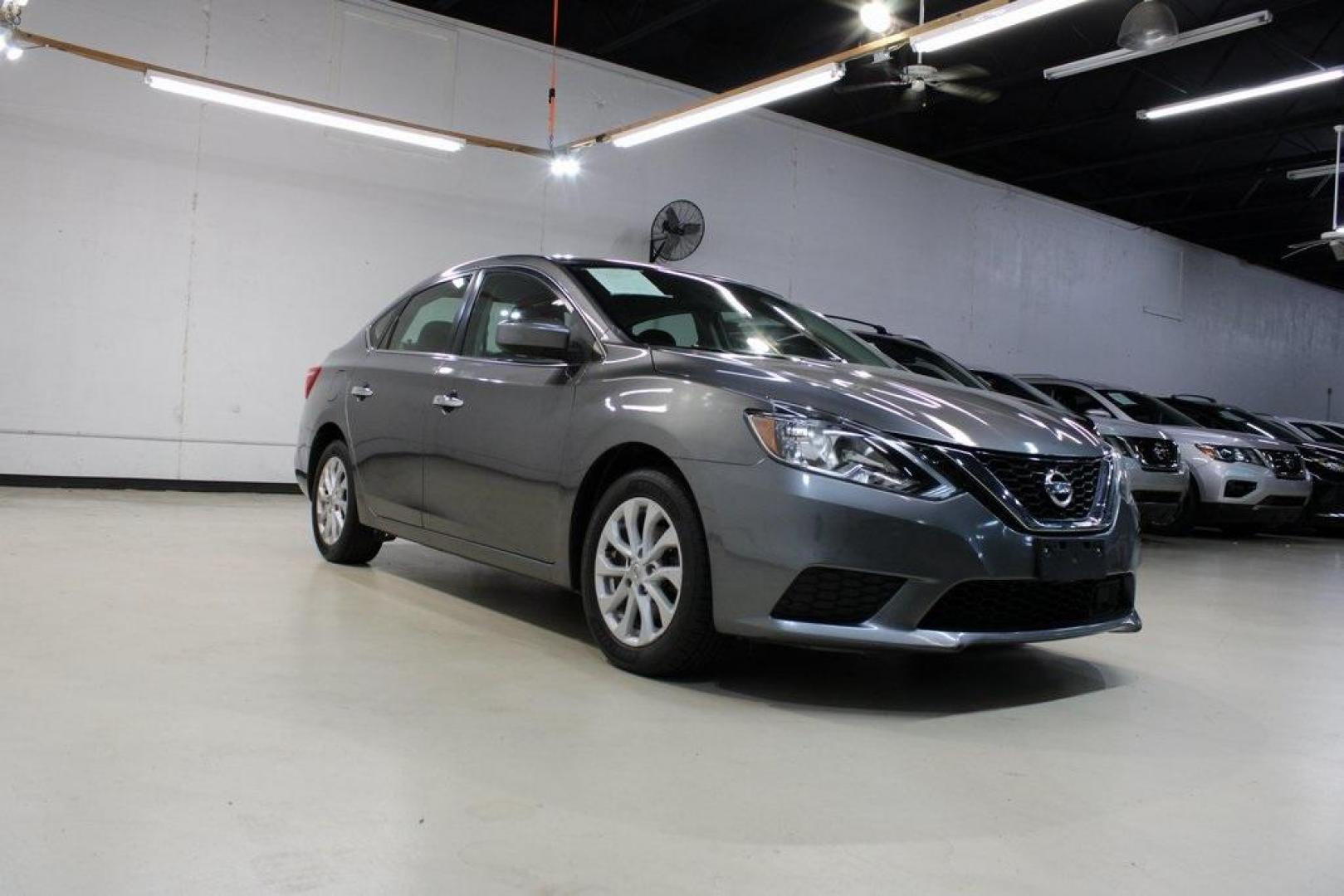 2019 Gun Metallic /Charcoal Nissan Sentra SV (3N1AB7AP8KY) with an 1.8L 4-Cylinder DOHC 16V engine, CVT transmission, located at 15300 Midway Rd., Addison, TX, 75001, (972) 702-0011, 32.958321, -96.838074 - HOME OF THE NO HAGGLE PRICE - WHOLESALE PRICES TO THE PUBLIC!!<br><br>Gun Metallic 2019 Nissan Sentra SV<br><br>Recent Arrival! 29/37 City/Highway MPG<br><br><br>At Midway Auto Group, we strive to provide you with the best quality vehicles for the lowest possible price, and this 2019 Nissan Sentra i - Photo#1