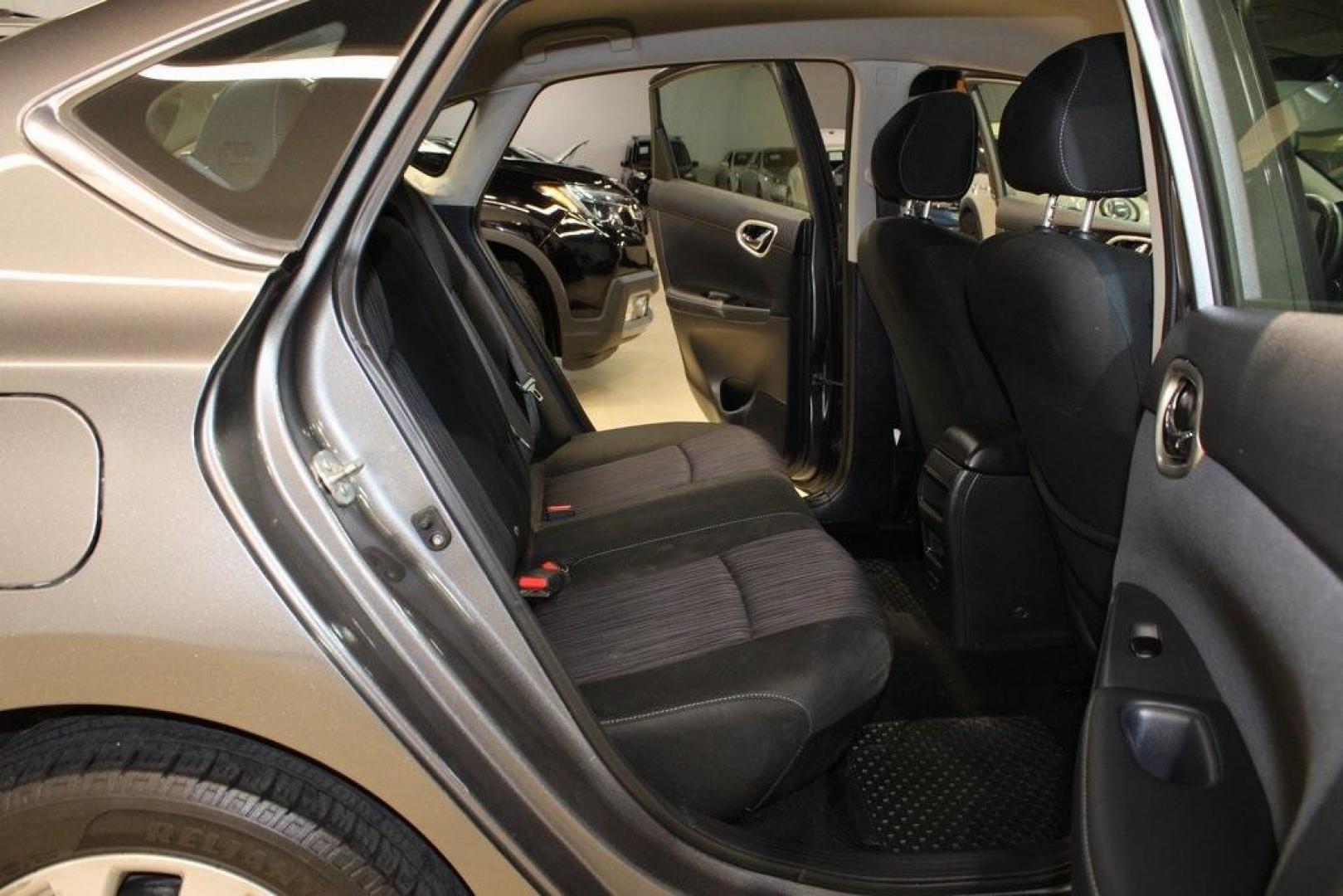 2019 Gun Metallic /Charcoal Nissan Sentra SV (3N1AB7AP8KY) with an 1.8L 4-Cylinder DOHC 16V engine, CVT transmission, located at 15300 Midway Rd., Addison, TX, 75001, (972) 702-0011, 32.958321, -96.838074 - HOME OF THE NO HAGGLE PRICE - WHOLESALE PRICES TO THE PUBLIC!!<br><br>Gun Metallic 2019 Nissan Sentra SV<br><br>Recent Arrival! 29/37 City/Highway MPG<br><br><br>At Midway Auto Group, we strive to provide you with the best quality vehicles for the lowest possible price, and this 2019 Nissan Sentra i - Photo#14