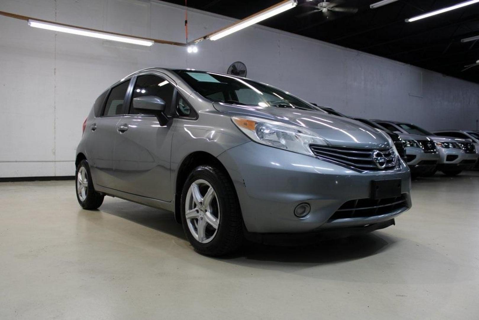 2015 Magnetic Gray Metallic /Charcoal Nissan Versa Note S (3N1CE2CP4FL) with an 1.6L 4-Cylinder DOHC 16V engine, Manual transmission, located at 15300 Midway Rd., Addison, TX, 75001, (972) 702-0011, 32.958321, -96.838074 - HOME OF THE NO HAGGLE PRICE - WHOLESALE PRICES TO THE PUBLIC!! Priced below KBB Fair Purchase Price!<br><br>Magnetic Gray Metallic 2015 Nissan Versa Note S<br><br>27/36 City/Highway MPG<br><br><br>At Midway Auto Group, we strive to provide you with the best quality vehicles for the lowest possible p - Photo#1