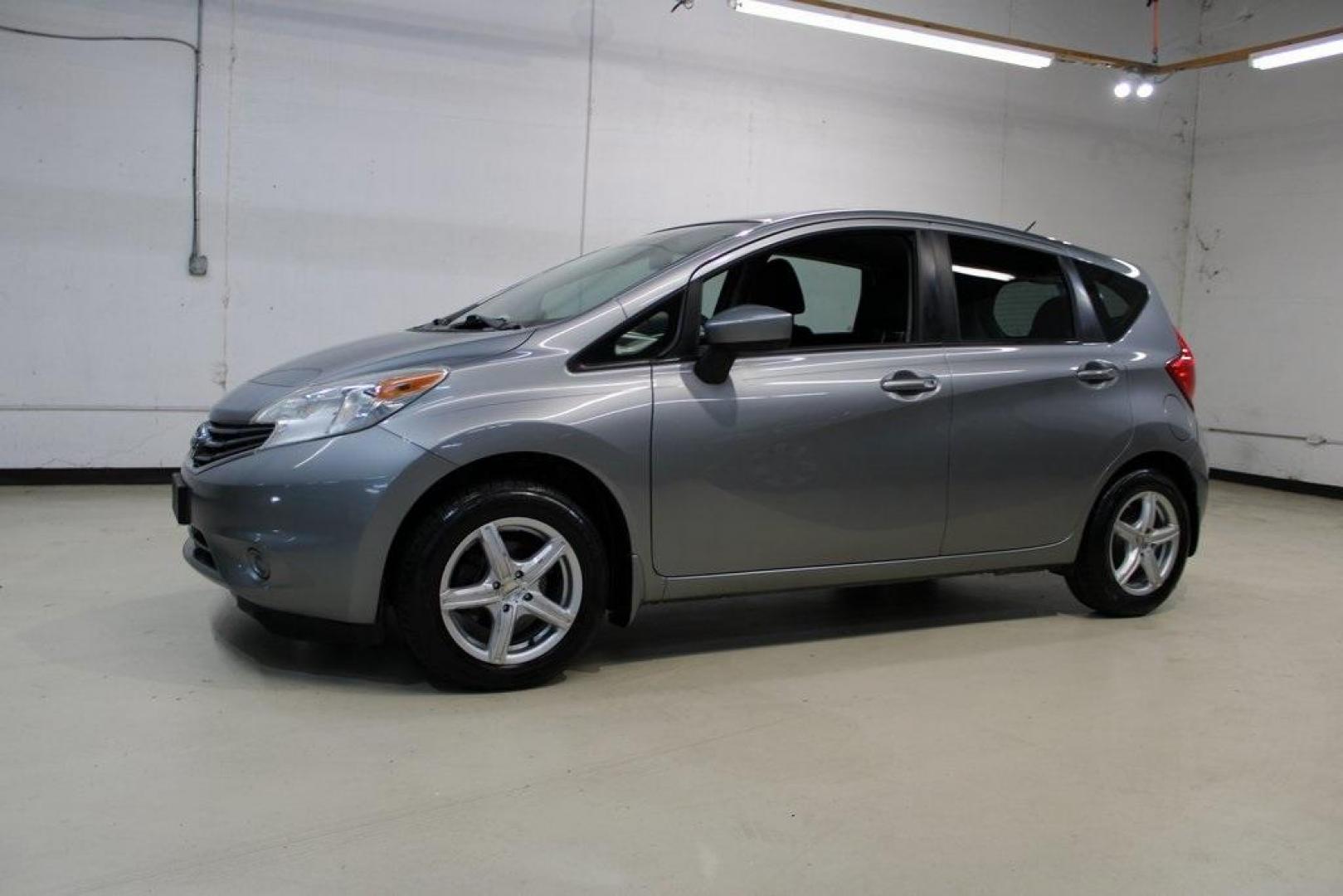 2015 Magnetic Gray Metallic /Charcoal Nissan Versa Note S (3N1CE2CP4FL) with an 1.6L 4-Cylinder DOHC 16V engine, Manual transmission, located at 15300 Midway Rd., Addison, TX, 75001, (972) 702-0011, 32.958321, -96.838074 - HOME OF THE NO HAGGLE PRICE - WHOLESALE PRICES TO THE PUBLIC!! Priced below KBB Fair Purchase Price!<br><br>Magnetic Gray Metallic 2015 Nissan Versa Note S<br><br>27/36 City/Highway MPG<br><br><br>At Midway Auto Group, we strive to provide you with the best quality vehicles for the lowest possible p - Photo#5