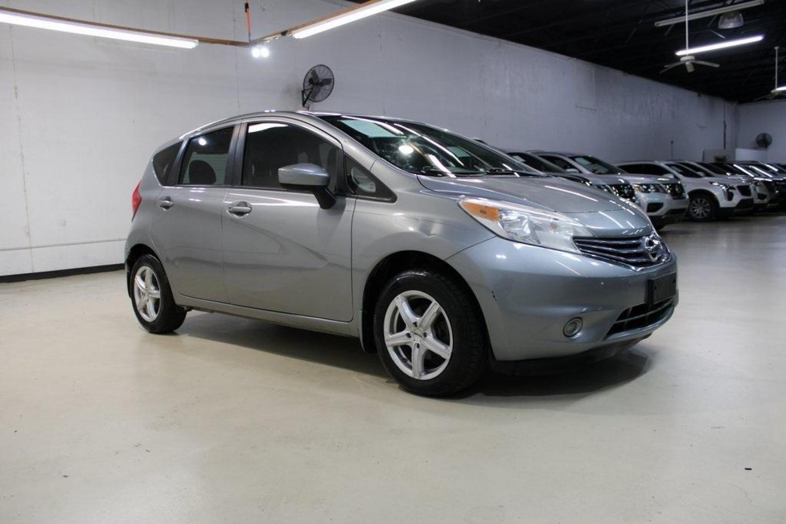 2015 Magnetic Gray Metallic /Charcoal Nissan Versa Note S (3N1CE2CP4FL) with an 1.6L 4-Cylinder DOHC 16V engine, Manual transmission, located at 15300 Midway Rd., Addison, TX, 75001, (972) 702-0011, 32.958321, -96.838074 - HOME OF THE NO HAGGLE PRICE - WHOLESALE PRICES TO THE PUBLIC!! Priced below KBB Fair Purchase Price!<br><br>Magnetic Gray Metallic 2015 Nissan Versa Note S<br><br>27/36 City/Highway MPG<br><br><br>At Midway Auto Group, we strive to provide you with the best quality vehicles for the lowest possible p - Photo#7