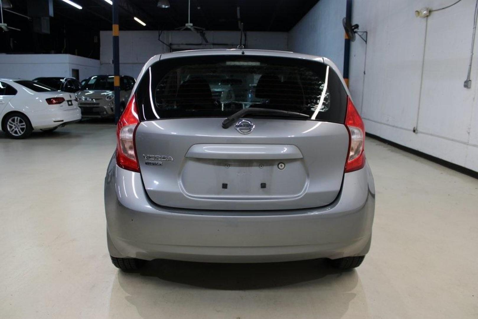 2015 Magnetic Gray Metallic /Charcoal Nissan Versa Note S (3N1CE2CP4FL) with an 1.6L 4-Cylinder DOHC 16V engine, Manual transmission, located at 15300 Midway Rd., Addison, TX, 75001, (972) 702-0011, 32.958321, -96.838074 - HOME OF THE NO HAGGLE PRICE - WHOLESALE PRICES TO THE PUBLIC!! Priced below KBB Fair Purchase Price!<br><br>Magnetic Gray Metallic 2015 Nissan Versa Note S<br><br>27/36 City/Highway MPG<br><br><br>At Midway Auto Group, we strive to provide you with the best quality vehicles for the lowest possible p - Photo#8