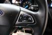 2017 Shadow Black /Charcoal Black Ford Focus SE (1FADP3FE8HL) with an EcoBoost 1.0L I3 GTDi DOHC Turbocharged VCT engine, Automatic transmission, located at 15300 Midway Rd., Addison, TX, 75001, (972) 702-0011, 32.958321, -96.838074 - HOME OF THE NO HAGGLE PRICE - WHOLESALE PRICES TO THE PUBLIC!!<br><br>Shadow Black 2017 Ford Focus SE<br><br>Recent Arrival! 27/38 City/Highway MPG<br><br>Awards:<br> * 2017 KBB.com 10 Most Awarded Brands * 2017 KBB.com Brand Image Awards<br><br>At Midway Auto Group, we strive to provide you with - Photo#23