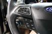 2017 Shadow Black /Charcoal Black Ford Focus SE (1FADP3FE8HL) with an EcoBoost 1.0L I3 GTDi DOHC Turbocharged VCT engine, Automatic transmission, located at 15300 Midway Rd., Addison, TX, 75001, (972) 702-0011, 32.958321, -96.838074 - HOME OF THE NO HAGGLE PRICE - WHOLESALE PRICES TO THE PUBLIC!!<br><br>Shadow Black 2017 Ford Focus SE<br><br>Recent Arrival! 27/38 City/Highway MPG<br><br>Awards:<br> * 2017 KBB.com 10 Most Awarded Brands * 2017 KBB.com Brand Image Awards<br><br>At Midway Auto Group, we strive to provide you with - Photo#24