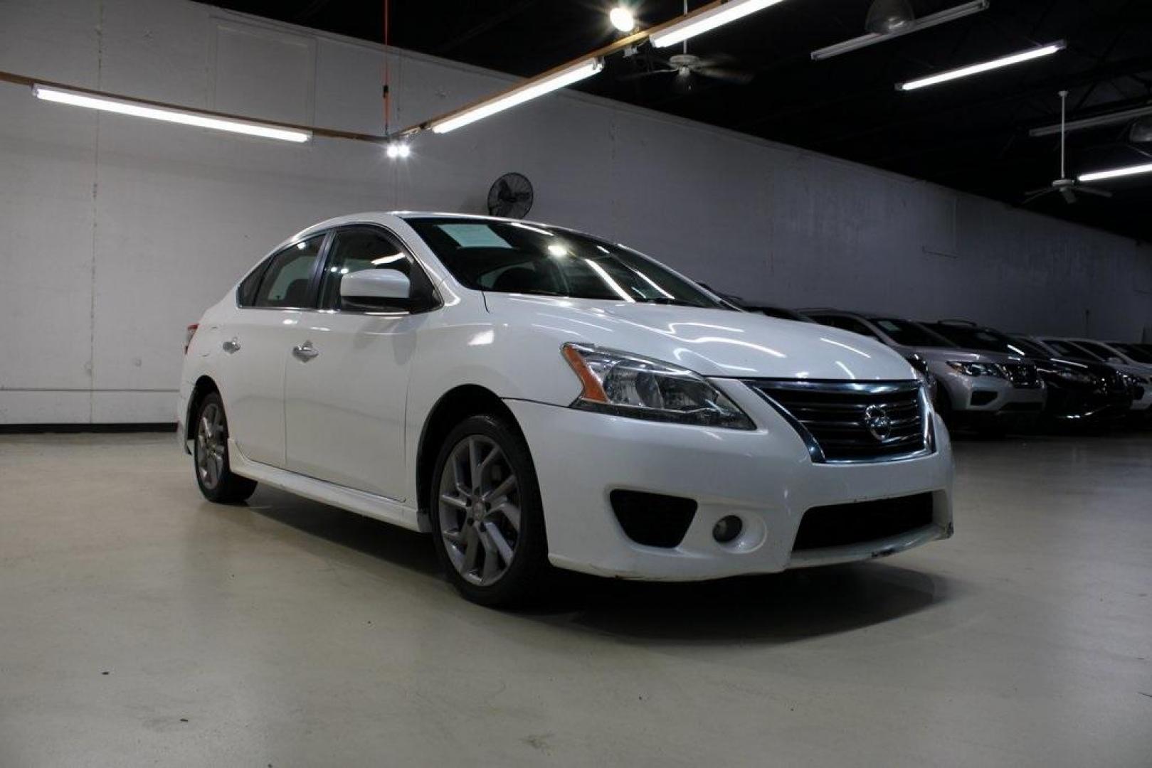 2014 Aspen White /Charcoal Nissan Sentra SR (3N1AB7AP6EY) with an 1.8L 4-Cylinder DOHC 16V engine, CVT transmission, located at 15300 Midway Rd., Addison, TX, 75001, (972) 702-0011, 32.958321, -96.838074 - HOME OF THE NO HAGGLE PRICE - WHOLESALE PRICES TO THE PUBLIC!!<br><br>Aspen White 2014 Nissan Sentra SR<br><br>30/39 City/Highway MPG<br><br>Awards:<br> * 2014 KBB.com 10 Best Used Compact Cars Under $10,000<br><br>At Midway Auto Group, we strive to provide you with the best quality vehicles for th - Photo#1