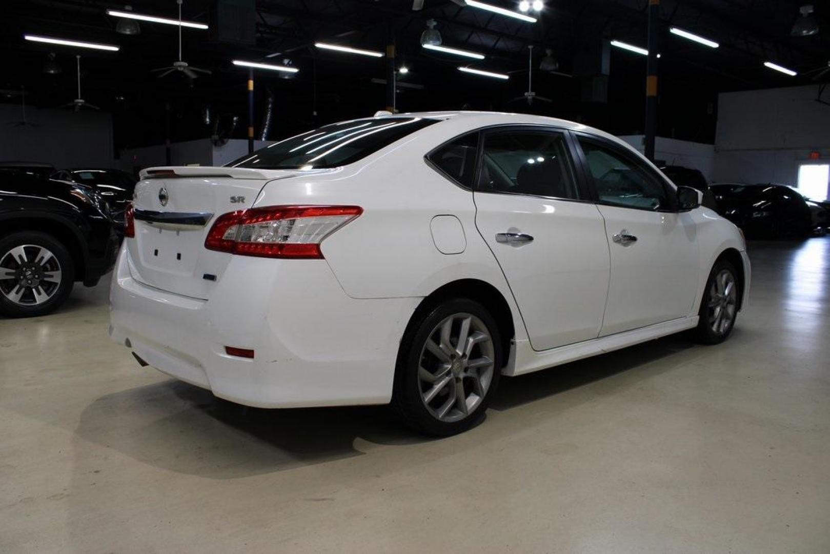 2014 Aspen White /Charcoal Nissan Sentra SR (3N1AB7AP6EY) with an 1.8L 4-Cylinder DOHC 16V engine, CVT transmission, located at 15300 Midway Rd., Addison, TX, 75001, (972) 702-0011, 32.958321, -96.838074 - HOME OF THE NO HAGGLE PRICE - WHOLESALE PRICES TO THE PUBLIC!!<br><br>Aspen White 2014 Nissan Sentra SR<br><br>30/39 City/Highway MPG<br><br>Awards:<br> * 2014 KBB.com 10 Best Used Compact Cars Under $10,000<br><br>At Midway Auto Group, we strive to provide you with the best quality vehicles for th - Photo#2