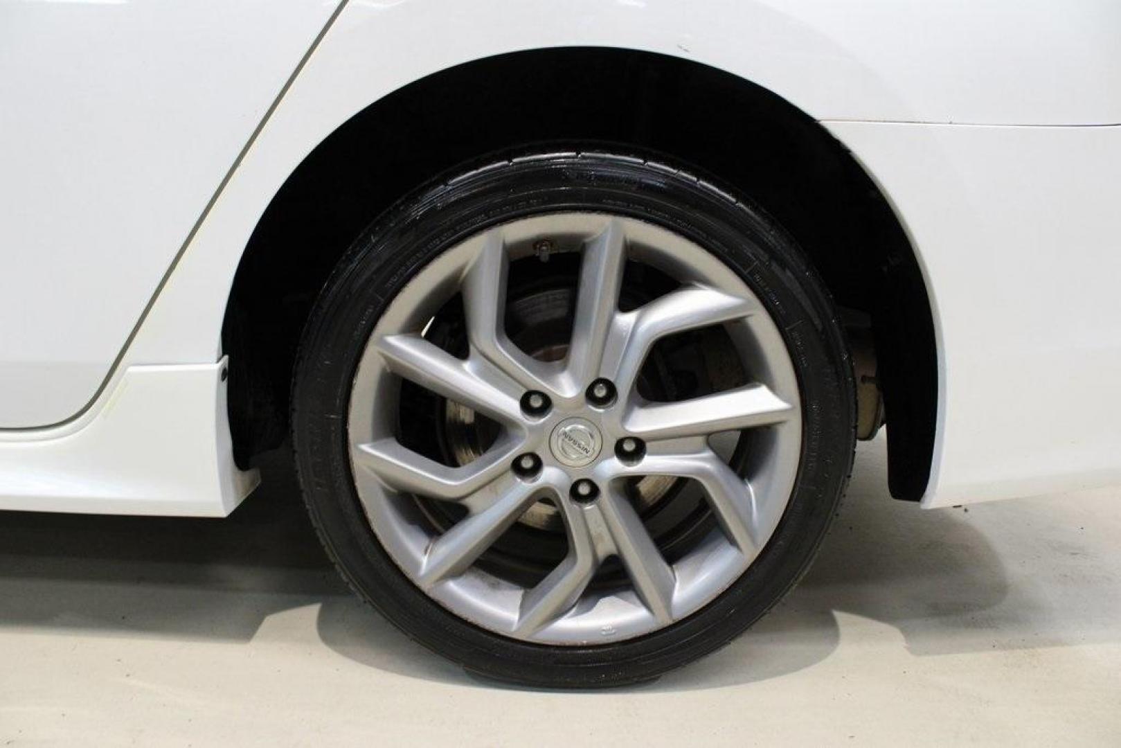 2014 Aspen White /Charcoal Nissan Sentra SR (3N1AB7AP6EY) with an 1.8L 4-Cylinder DOHC 16V engine, CVT transmission, located at 15300 Midway Rd., Addison, TX, 75001, (972) 702-0011, 32.958321, -96.838074 - HOME OF THE NO HAGGLE PRICE - WHOLESALE PRICES TO THE PUBLIC!!<br><br>Aspen White 2014 Nissan Sentra SR<br><br>30/39 City/Highway MPG<br><br>Awards:<br> * 2014 KBB.com 10 Best Used Compact Cars Under $10,000<br><br>At Midway Auto Group, we strive to provide you with the best quality vehicles for th - Photo#6