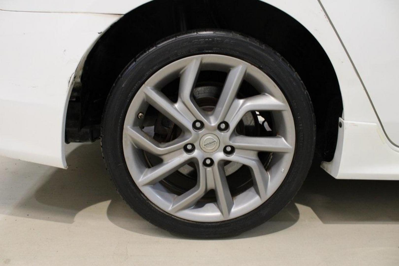 2014 Aspen White /Charcoal Nissan Sentra SR (3N1AB7AP6EY) with an 1.8L 4-Cylinder DOHC 16V engine, CVT transmission, located at 15300 Midway Rd., Addison, TX, 75001, (972) 702-0011, 32.958321, -96.838074 - HOME OF THE NO HAGGLE PRICE - WHOLESALE PRICES TO THE PUBLIC!!<br><br>Aspen White 2014 Nissan Sentra SR<br><br>30/39 City/Highway MPG<br><br>Awards:<br> * 2014 KBB.com 10 Best Used Compact Cars Under $10,000<br><br>At Midway Auto Group, we strive to provide you with the best quality vehicles for th - Photo#7